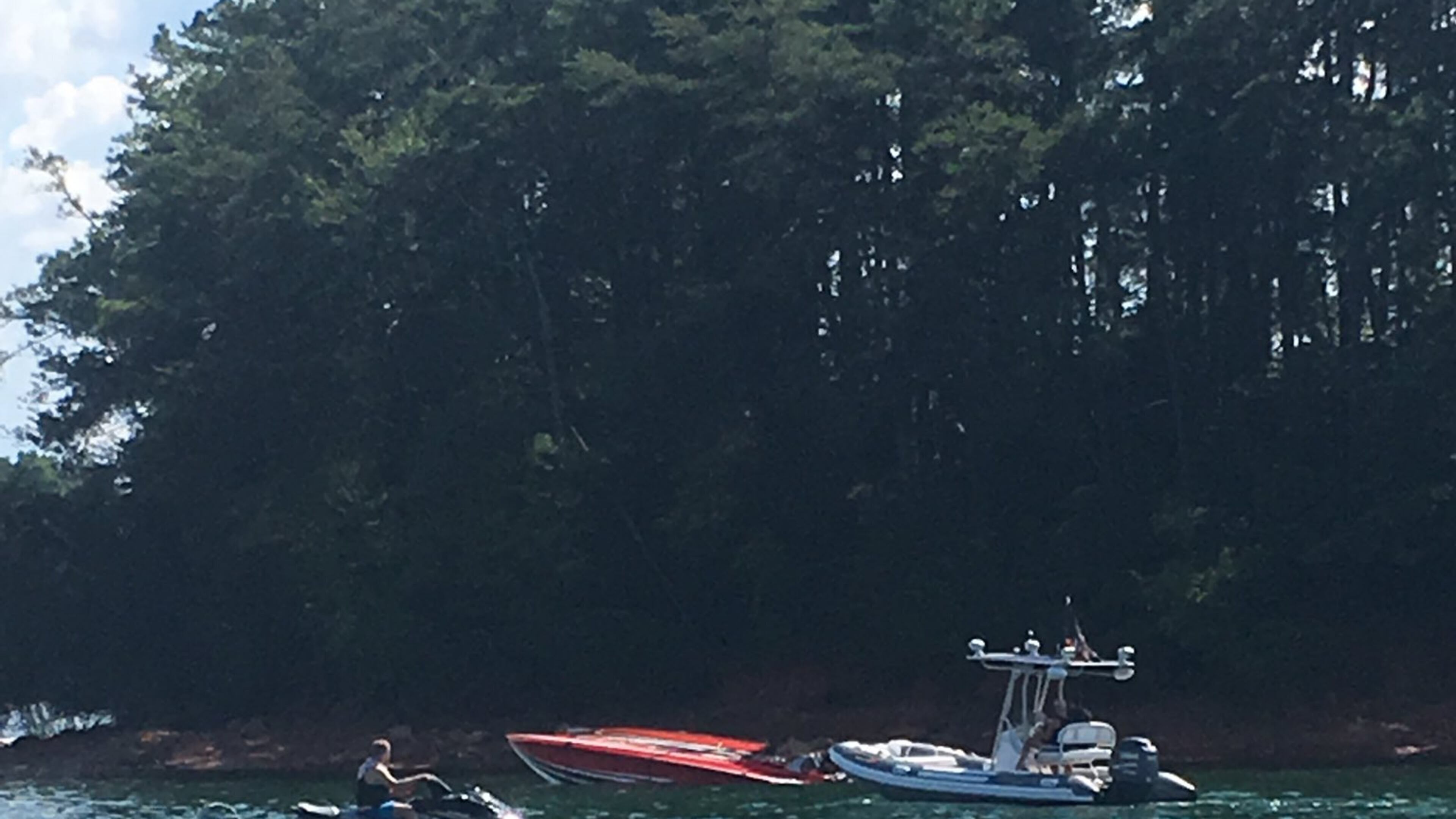 Officials are searching Lake Lanier after a boat overturned Friday. (Credit: Channel 2 Action News)