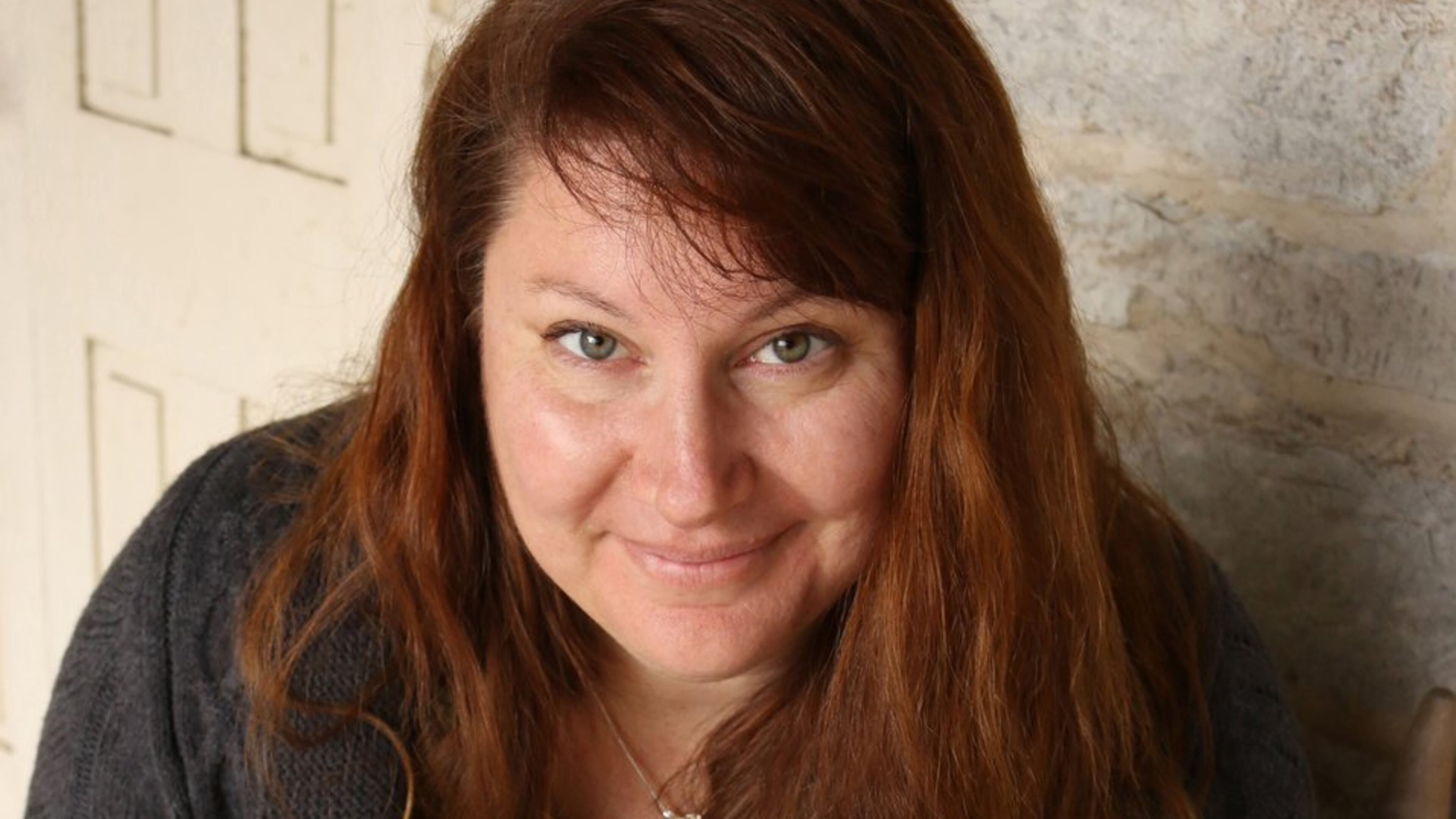 Valerie J. Frey, author of “Preserving Family Recipes,” holds a batch of her great-great-grandmother’s teacakes on a Depression glass platter passed down to her by her paternal grandmother. CONTRIBUTED BY AMBERLEE FLETCHER, LILAC LENS PHOTOGRAPHY