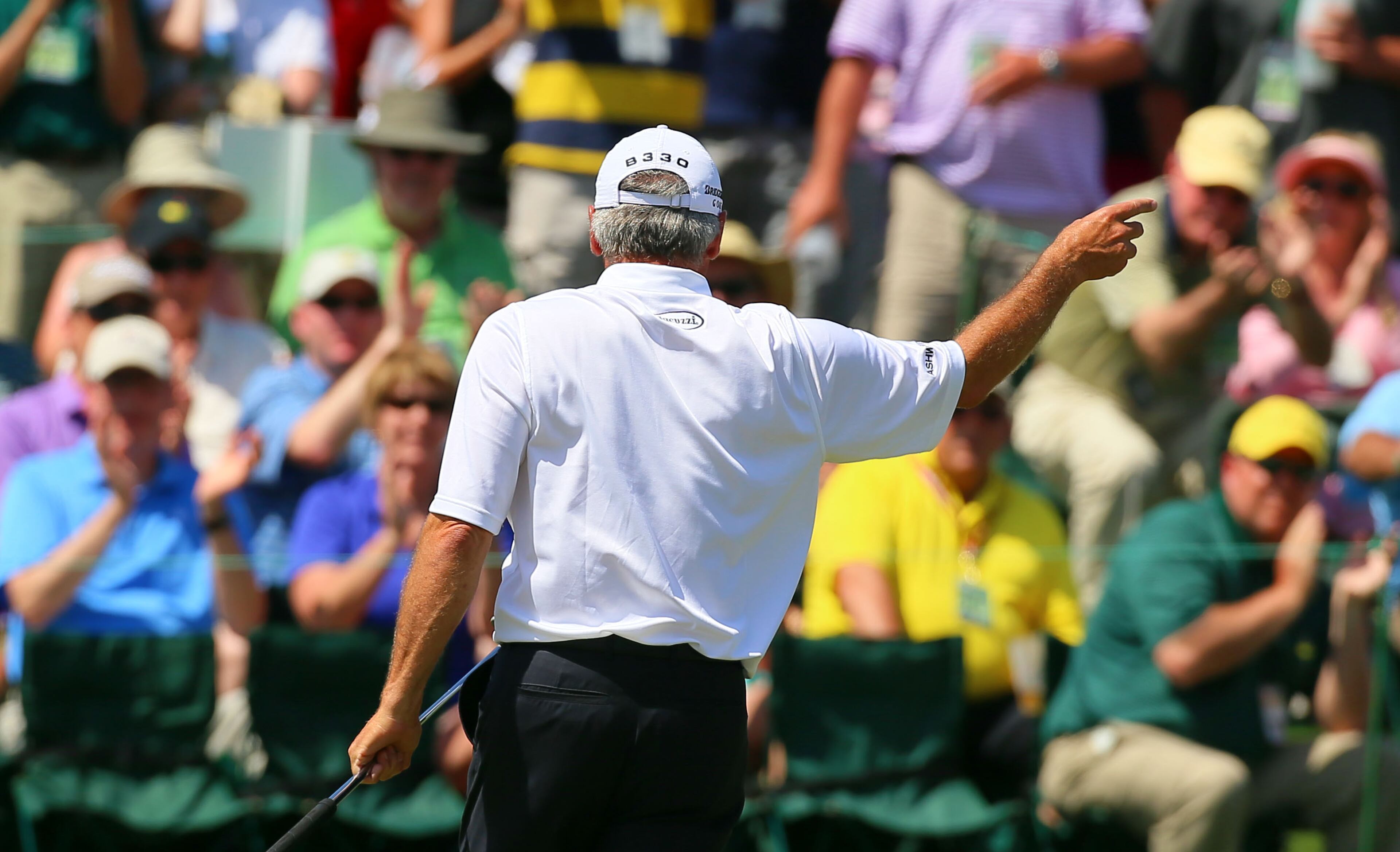 Fred Couples reacts to his birdie putt to go 5-under on #18 during the second round in the Masters Tournament on Friday April 12 2013. CURTIS COMPTON / CCOMPTON@AJC.COM