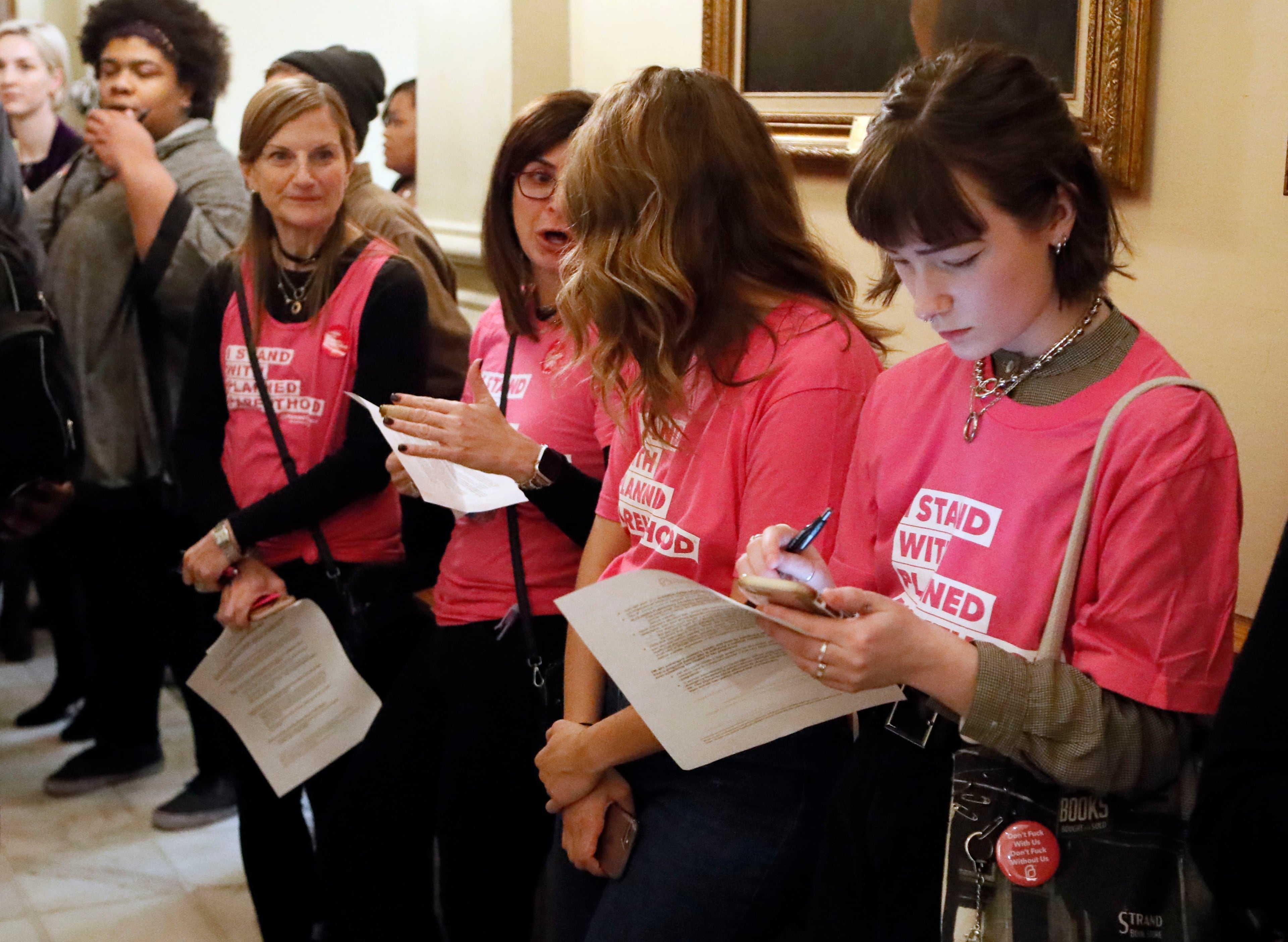 March 7, 2019 - Atlanta - Supporters of Planned Parenthood work the rope line outside the house chamber to message legislators to support their agenda which includes opposition to HB 481, which would severely toughen restrictions on abortions. The legislature was in session for "crossover" day, the 28th day of the 2019 General Assembly. Bob Andres / bandres@ajc.com