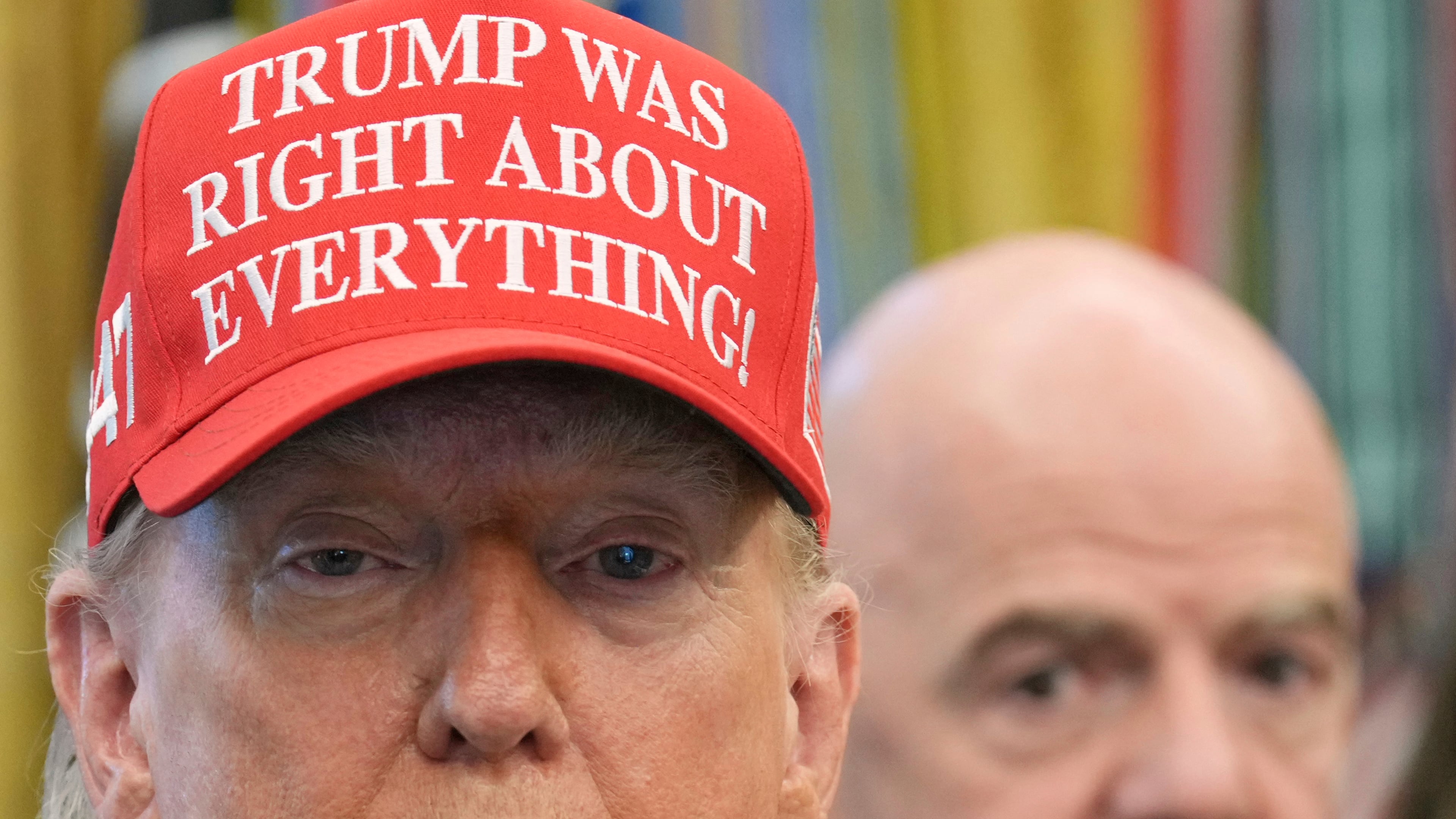 FILE - President Donald Trump speaks as FIFA President Gianni Infantino listens in the Oval Office of the White House, Friday, Aug. 22, 2025, in Washington. (AP Photo/Jacquelyn Martin, File)
