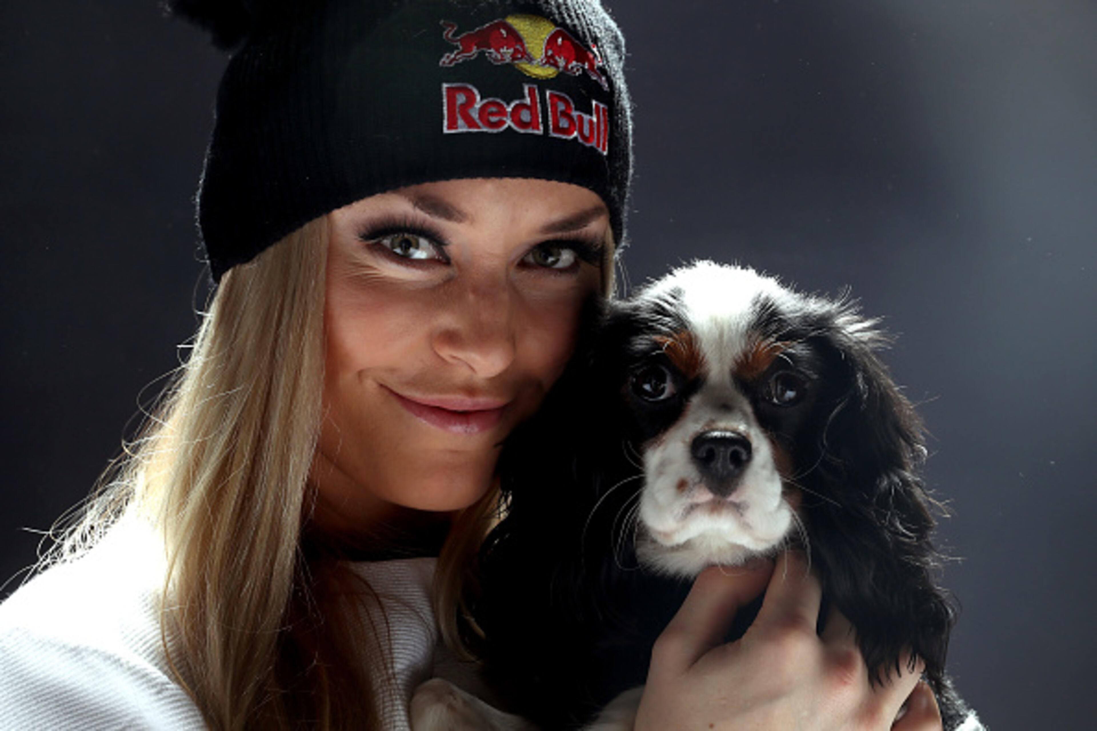 ST MORITZ, SWITZERLAND - FEBRUARY 05: Lindsey Vonn of USA poses with her dog Lucy after a press conference at Hotel Reine Victoria ahead of the FIS Alpine World Ski Championships on February 5, 2017 in St Moritz, Switzerland. (Photo by Alexander Hassenstein/Getty Images)