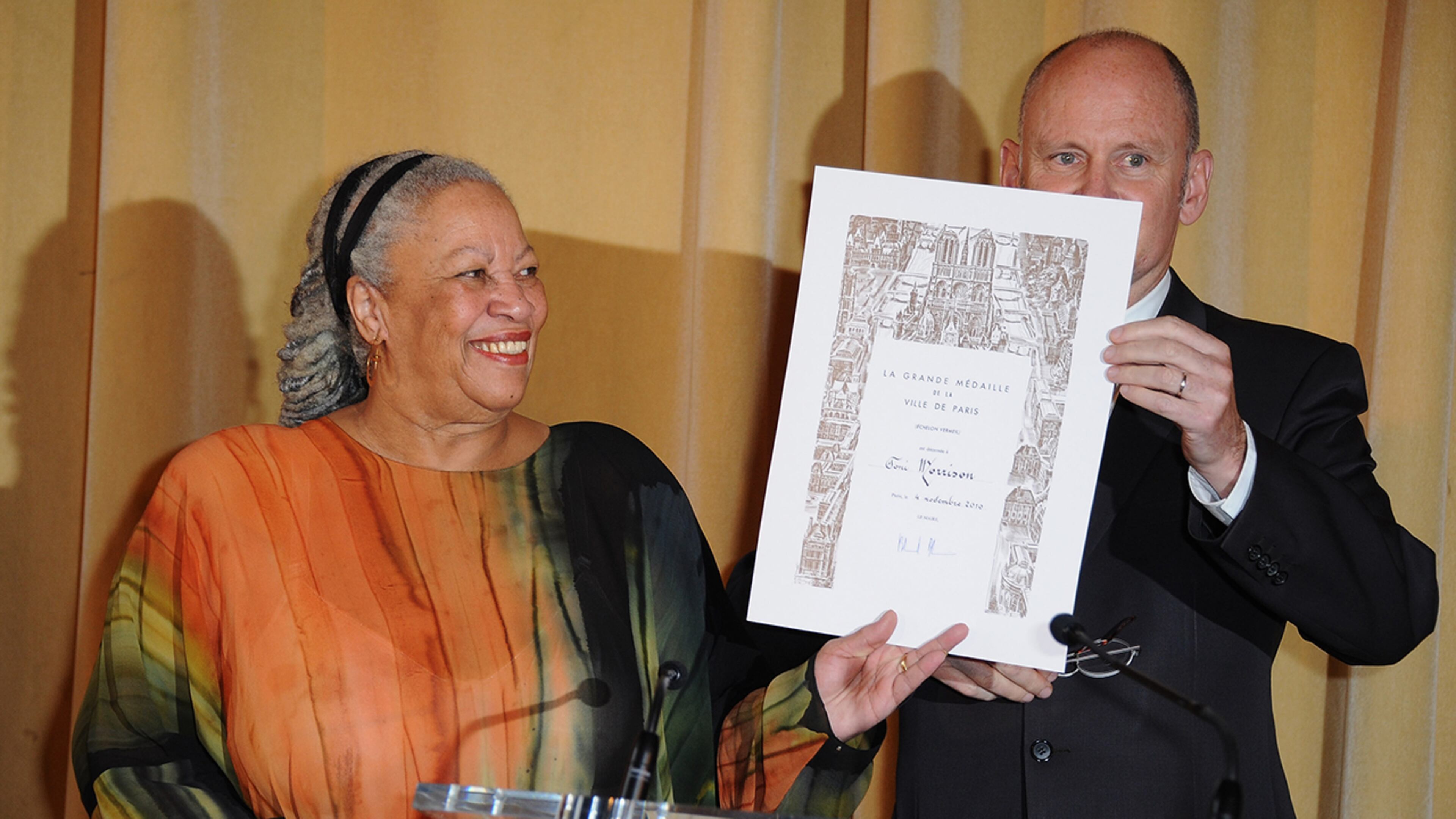 Toni Morrison receives the Honor Medal of The City of Paris from Christophe Girard (R) at Mairie de Paris on November 4, 2010 in Paris.