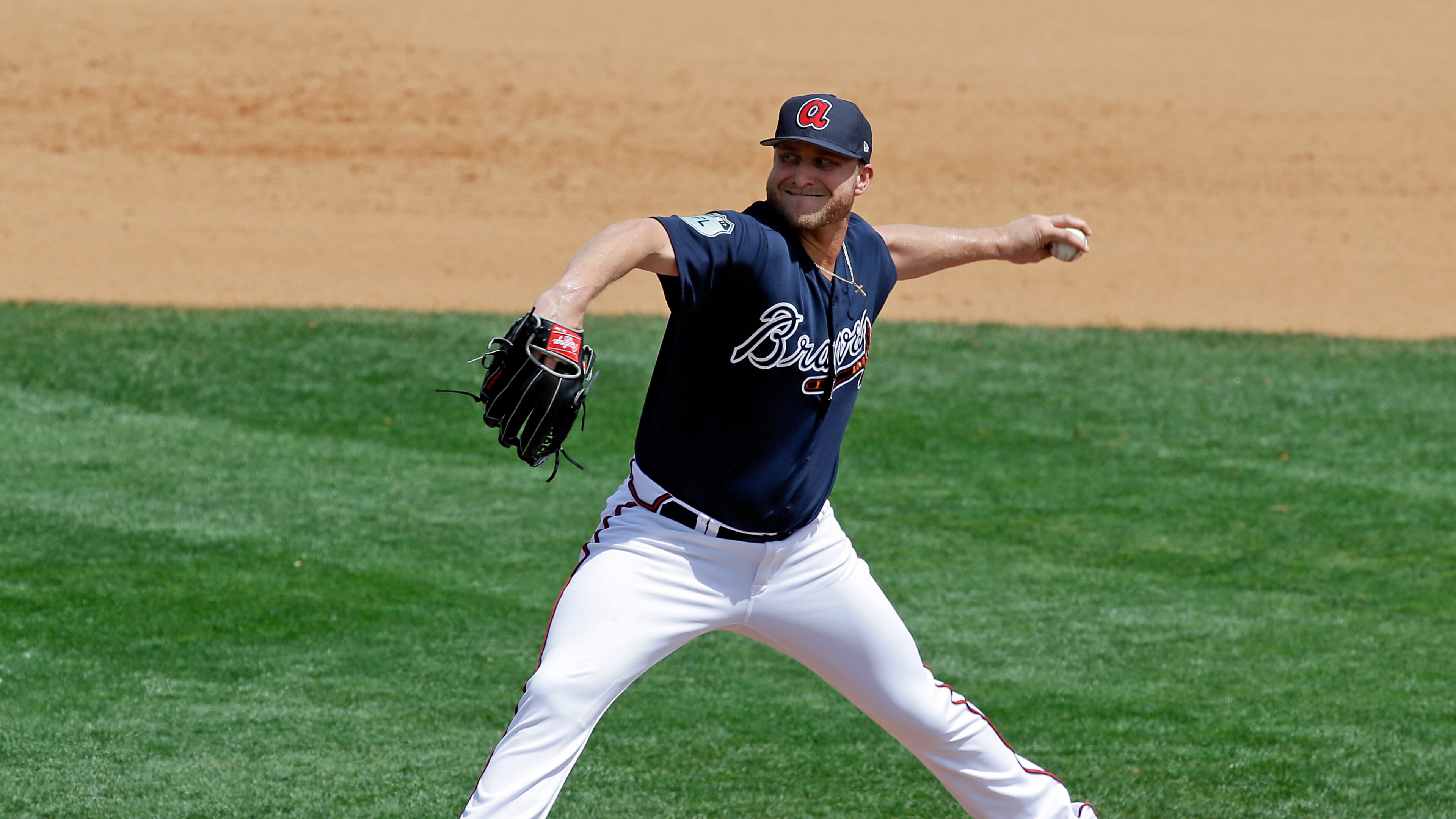 Atlanta Braves’ Kevin Chapman pitches against the New York Mets in the seventh inning of a spring training baseball game, Saturday, March 25, 2017, in Lake Buena Vista, Fla. (AP Photo/John Raoux)