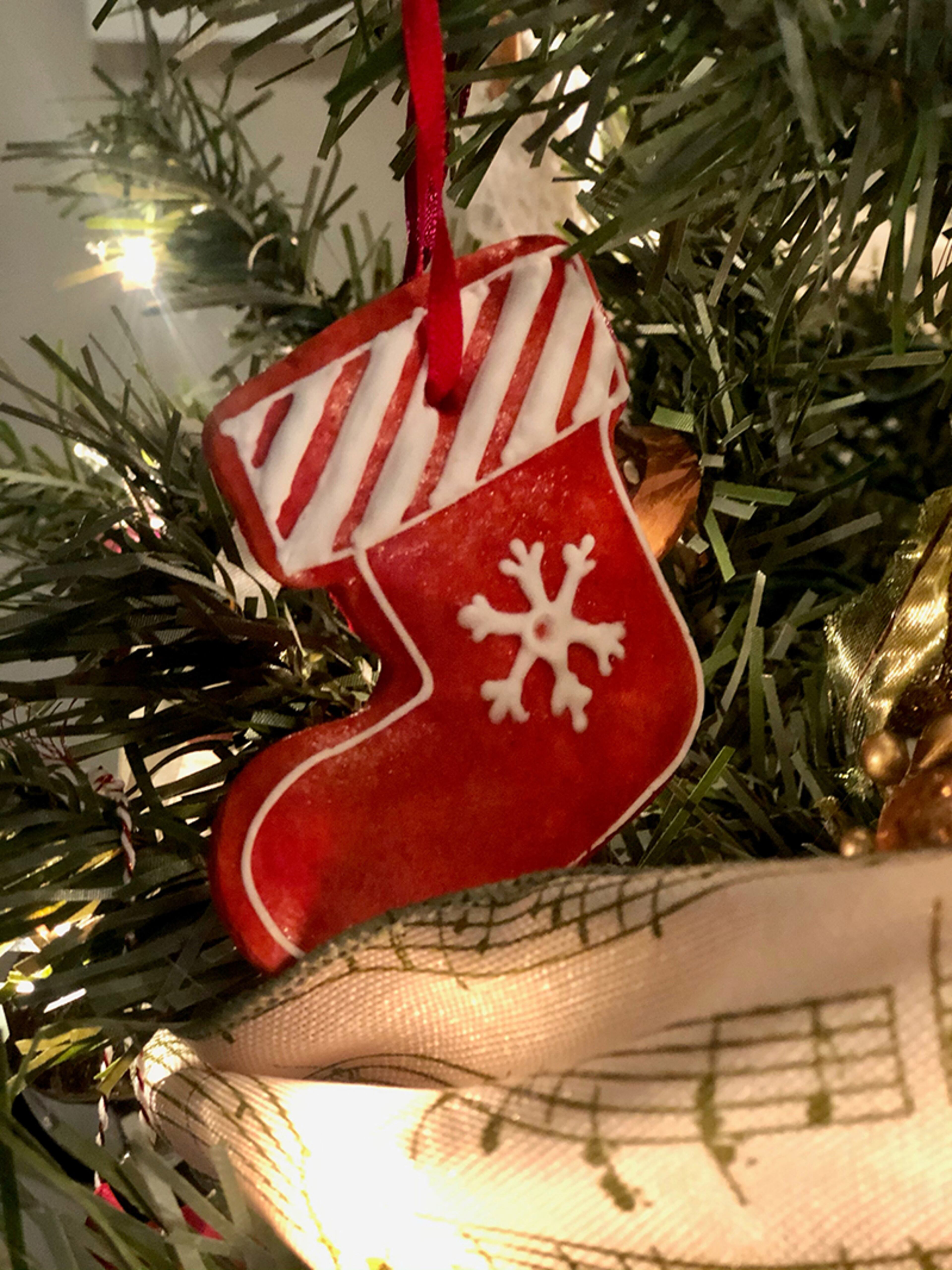 This is Betti Rosszer Figueroa's Hungarian-German Christmas tree, with crocheted ornaments, tiny clay bells, Moravian paper stars and gingerbread ornaments.