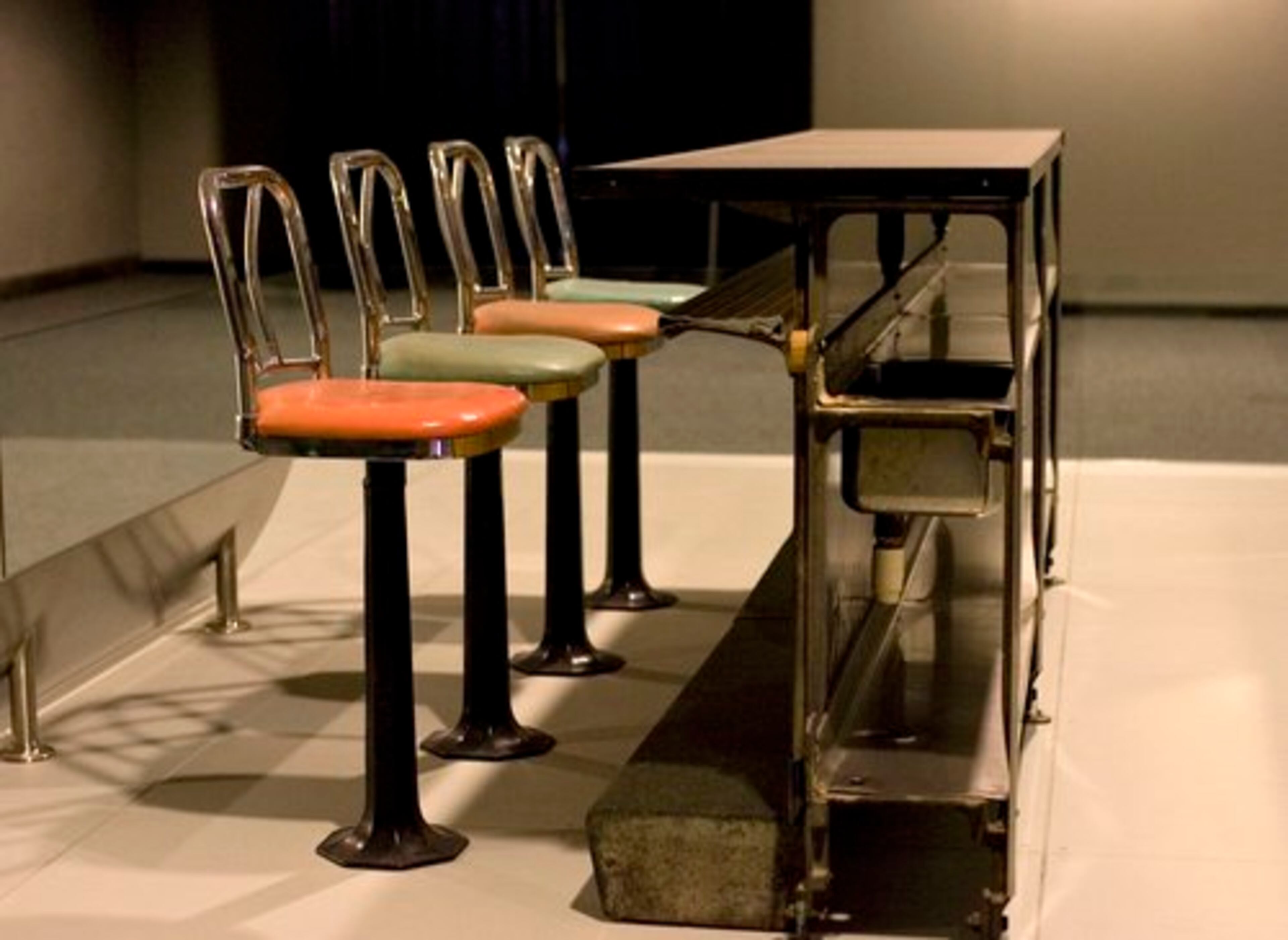 THE "WHITES-ONLY" lunch counter from a Greensboro, N.C., Woolworth's is preserved for posterity at the D.C. museum; in 1960, four black college students began a sit-in there that helped spark the civil-rights movement.