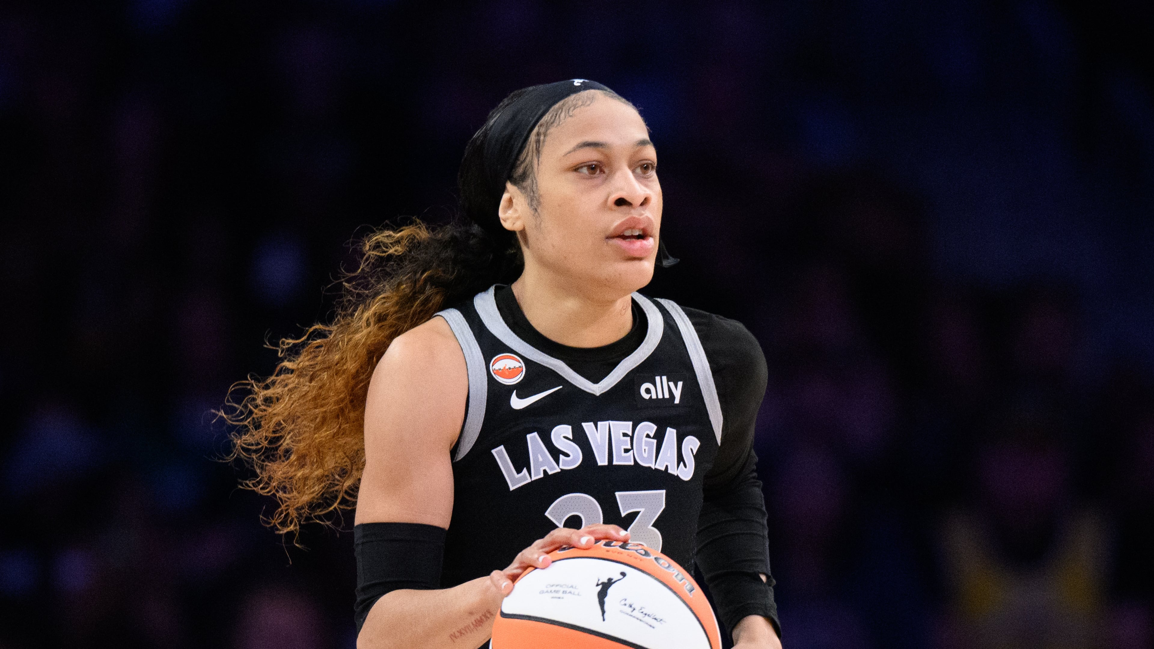 FILE - Las Vegas Aces guard Chennedy Carter (23) dribbles during a WNBA basketball game against the Los Angeles Sparks in Los Angeles, May 10, 2026. (AP Photo/Kyusung Gong, File)