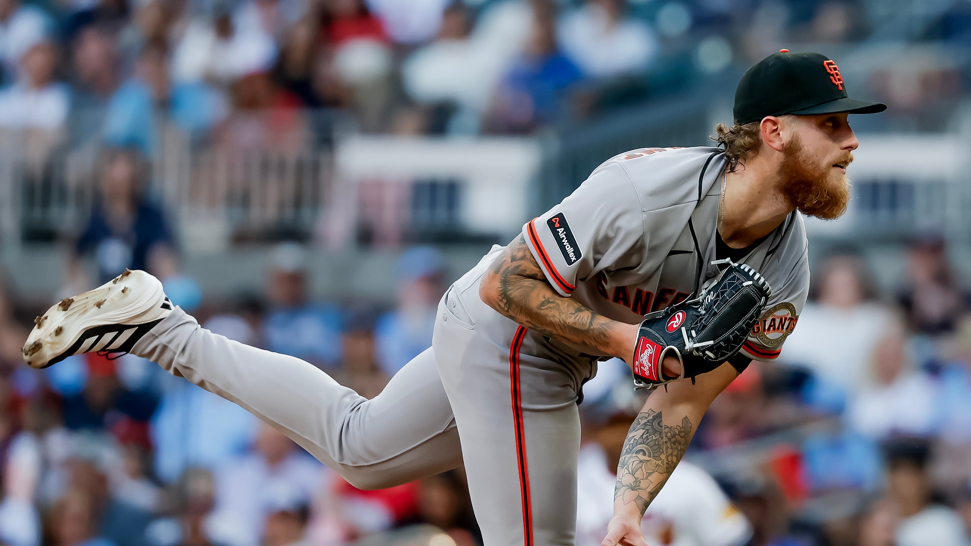 San Francisco Giants pitcher Carson Whisenhunt delivers to an Atlanta Braves batter during the first inning of a baseball game, Wednesday, June 17, 2026, in Atlanta. (AP Photo/Erik S. Lesser)