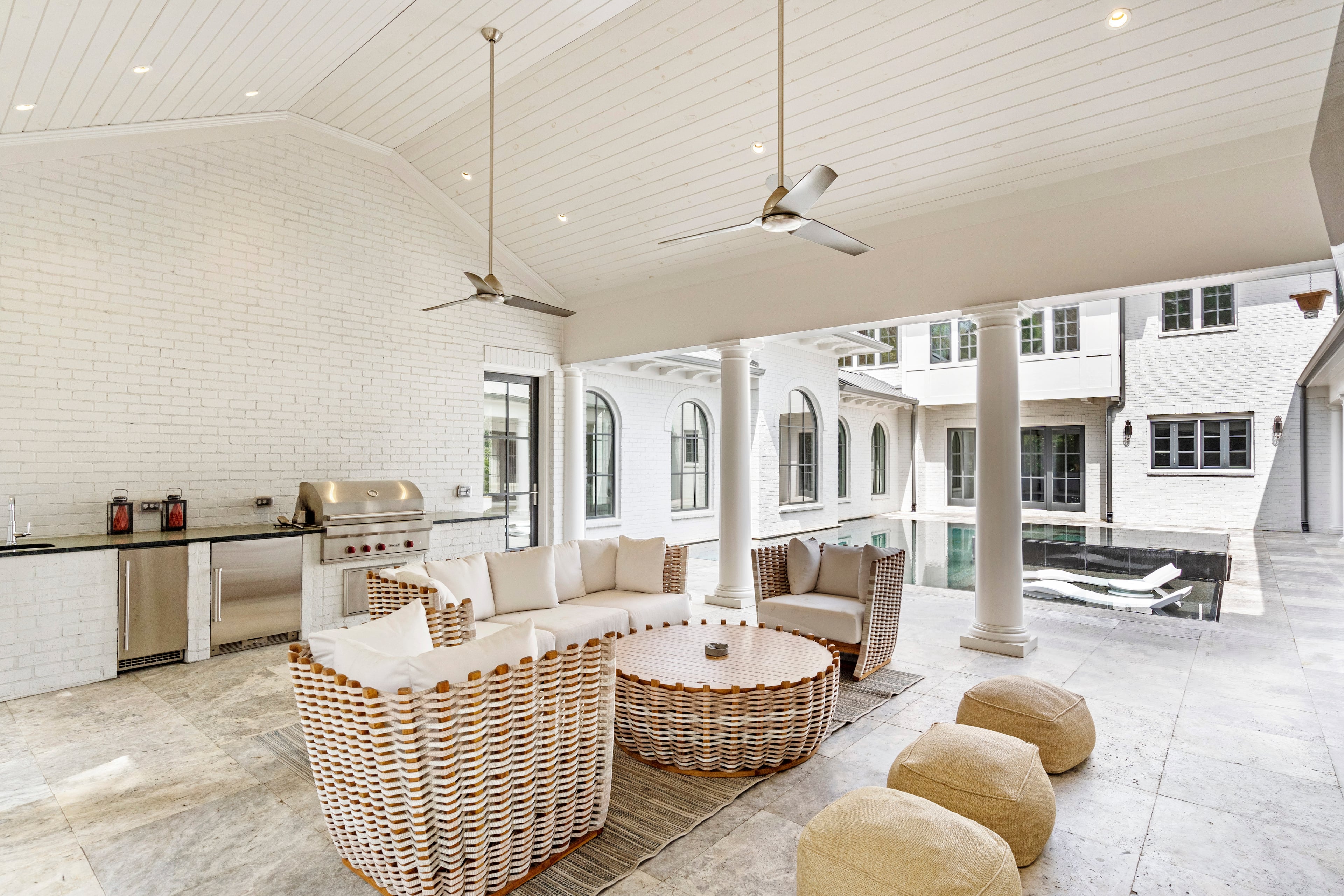 The outdoor hang out area has a full kitchen so the home chef doesn't have to be separated from guests.