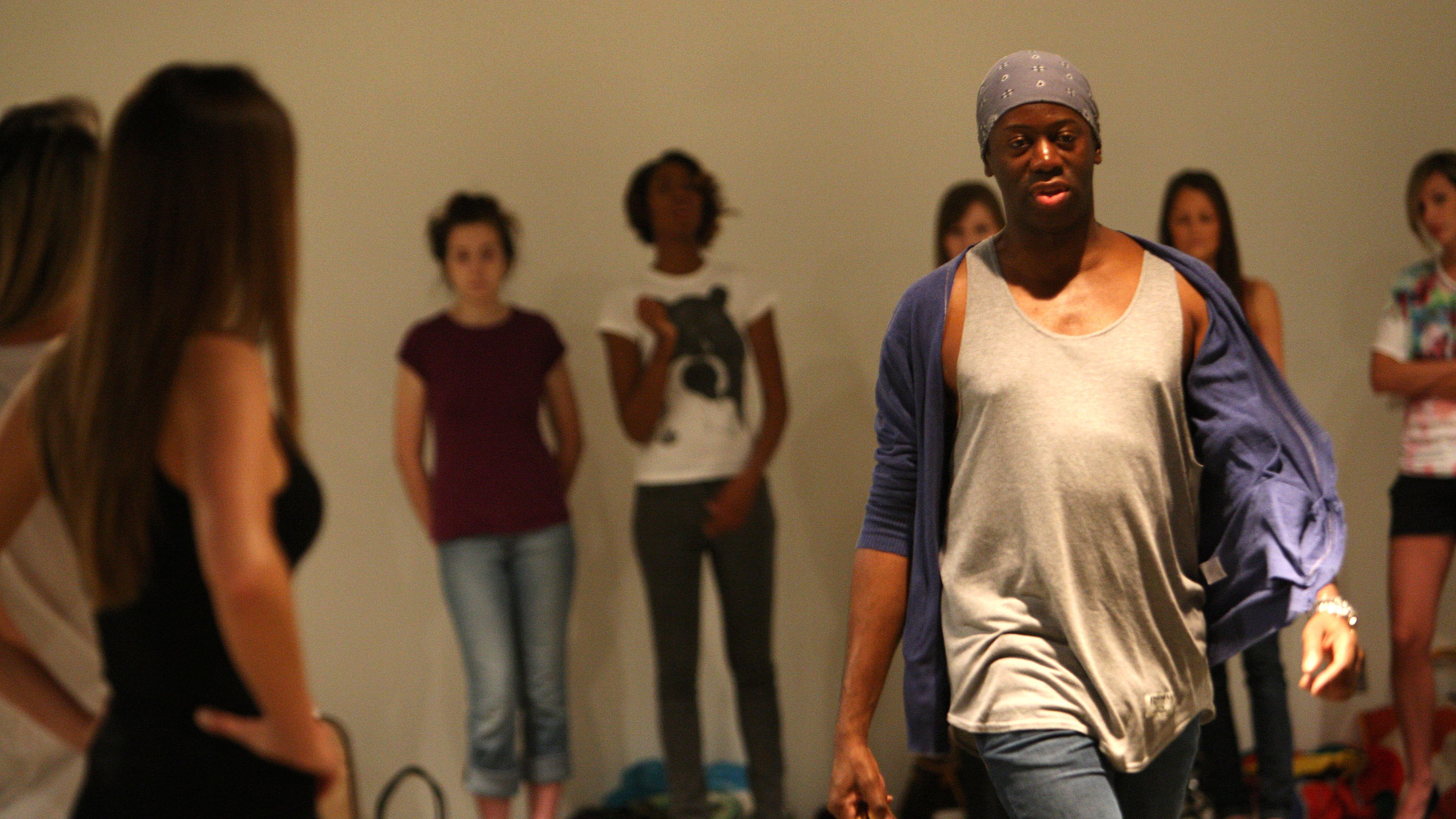 Atlanta - Runway coach from America’s Next Top Model “Miss J” aka J. Alexander demonstrates to SCAD models how to improve elegance, posture, and movement — and the proper way to hold a handbag — Friday, April 30, 2010. Miss J started his career working for Jean Paul Gaultier in New York and after a modeling stint in Tokyo, settled in Paris and became a sought after runway coach. (Vino Wong/AJC)