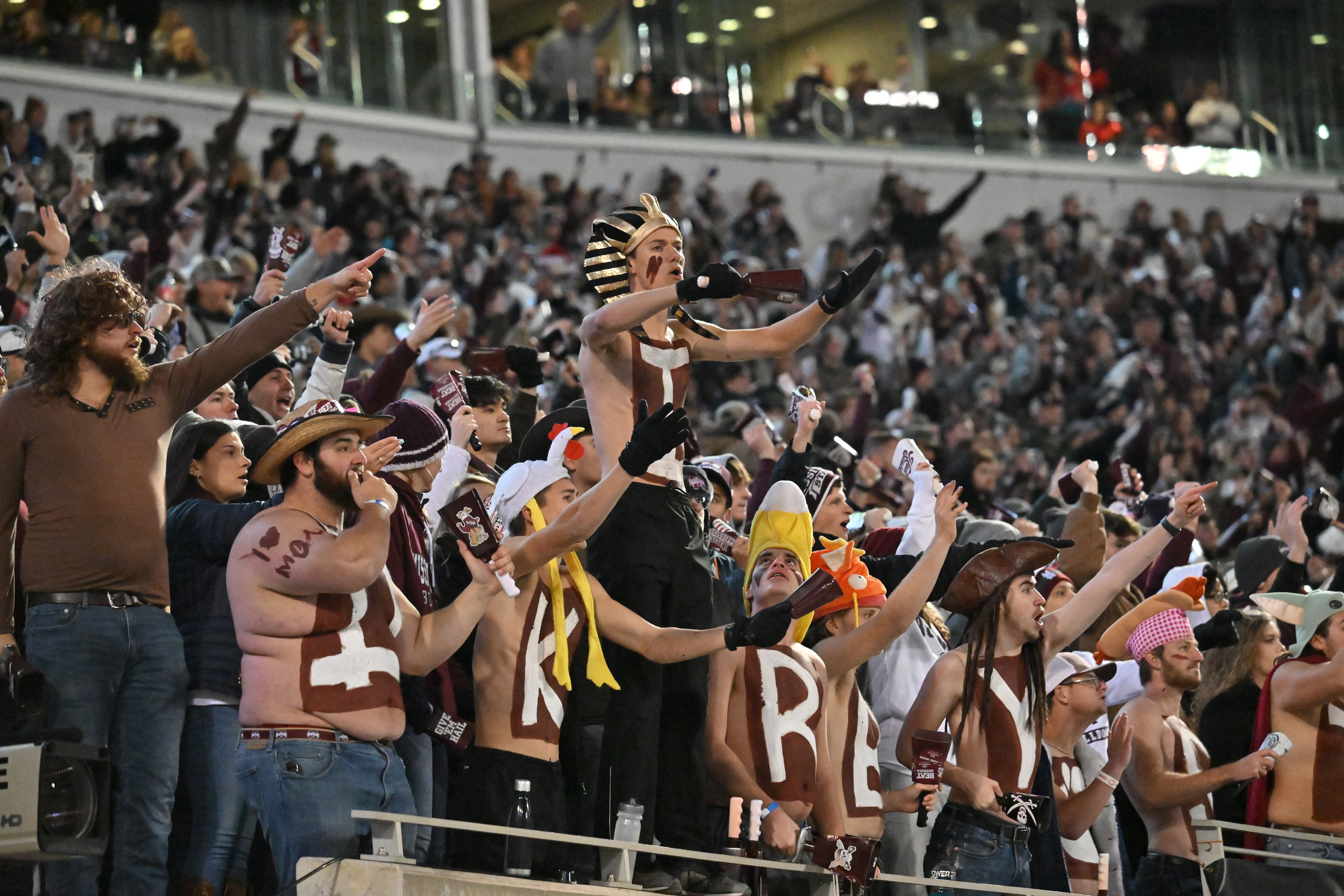 Mississippi State fans cheer for their team during the first half in an NCAA football game at Davis Wade Stadium in Starkville on Saturday, November 12, 2022. (Hyosub Shin / Hyosub.Shin@ajc.com)