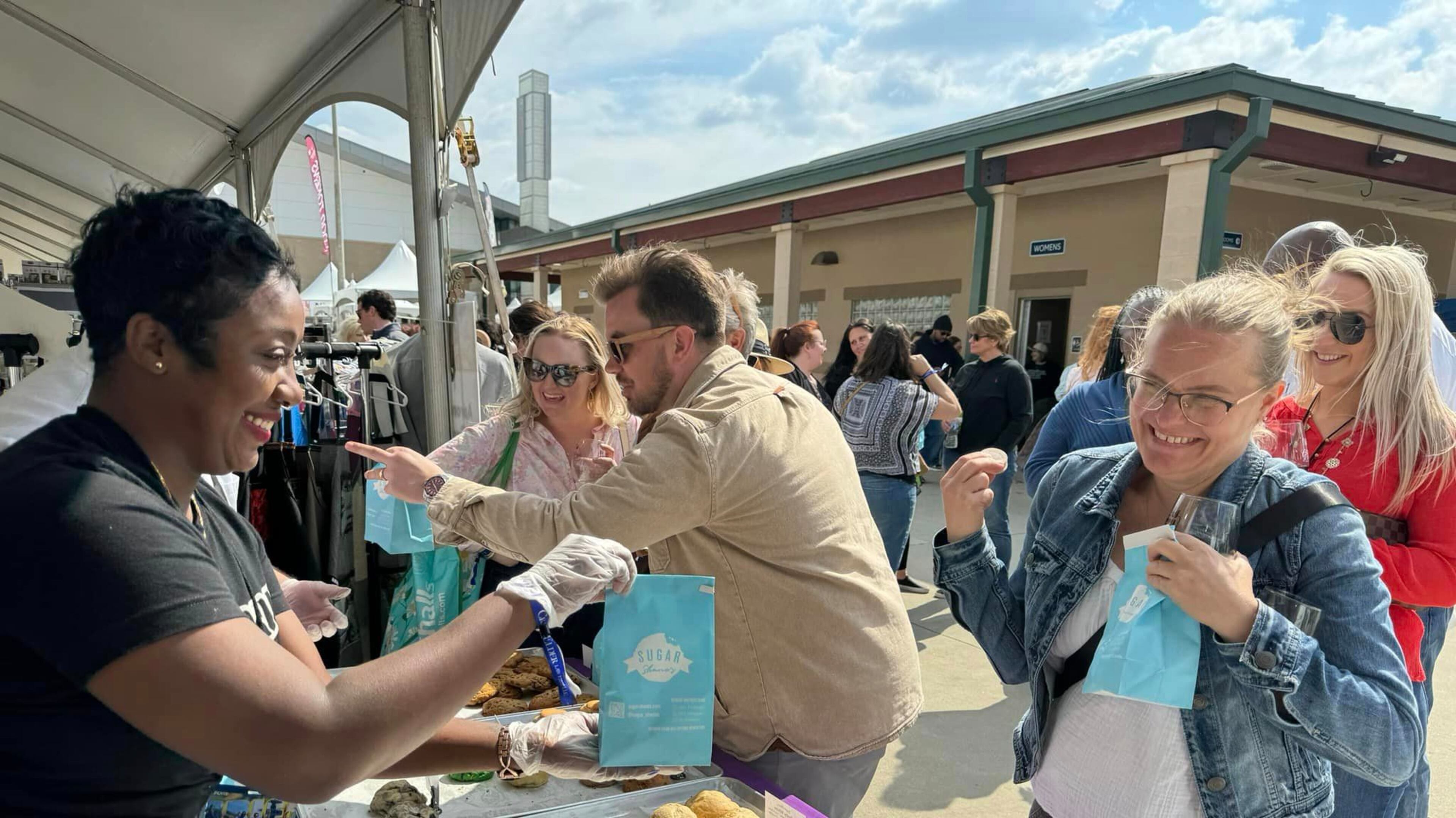 The Georgia Food + Wine Festival offers this cookie customer a sweet reason to smile. (Courtesy of Georgia Food + Wine Festival)