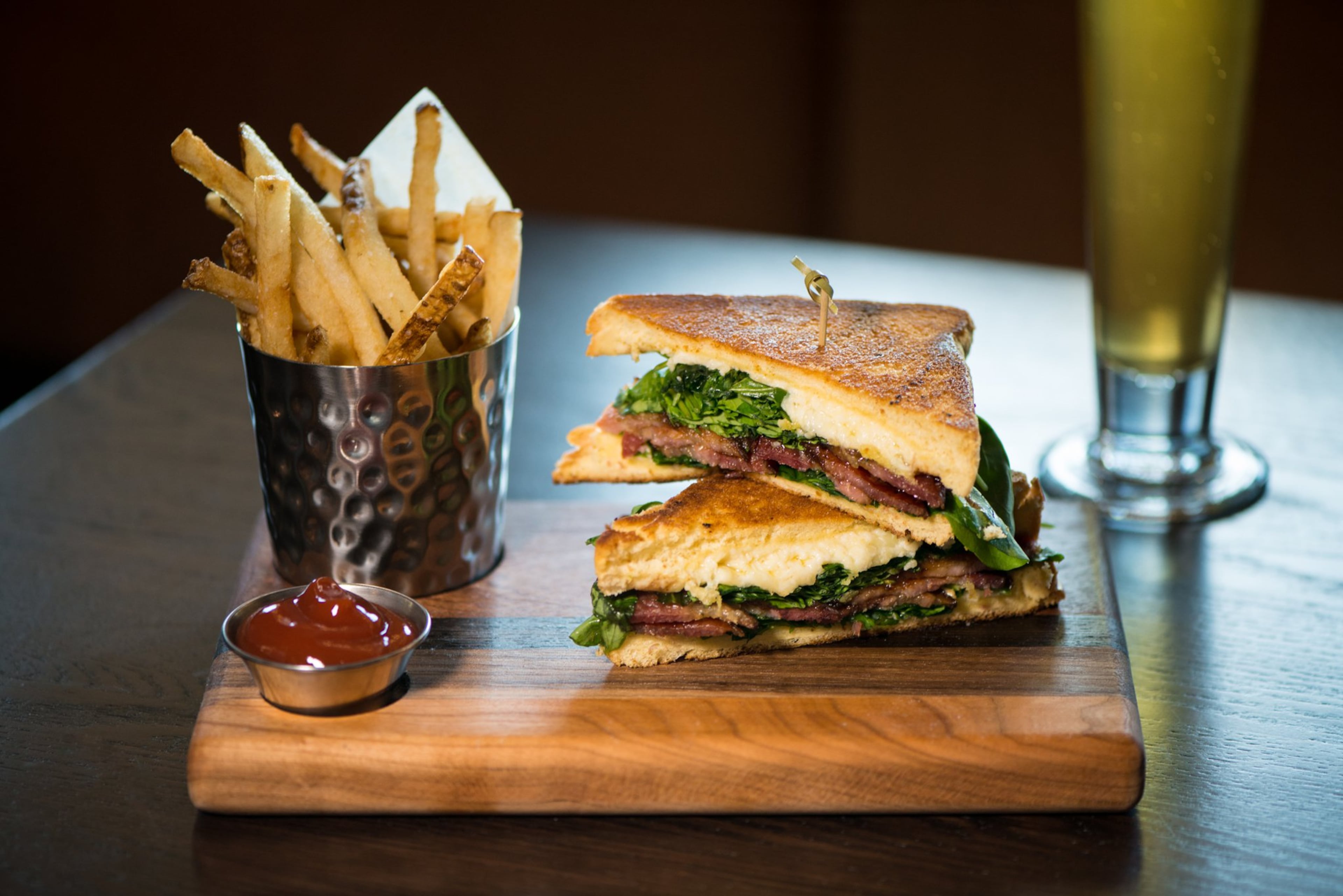 New Realm Brewing "B-ATL" Grilled Cheese with bacon, Thomasville Tomme, Georgia Apple Butter, Arugula. Photo credit- Mia Yakel.