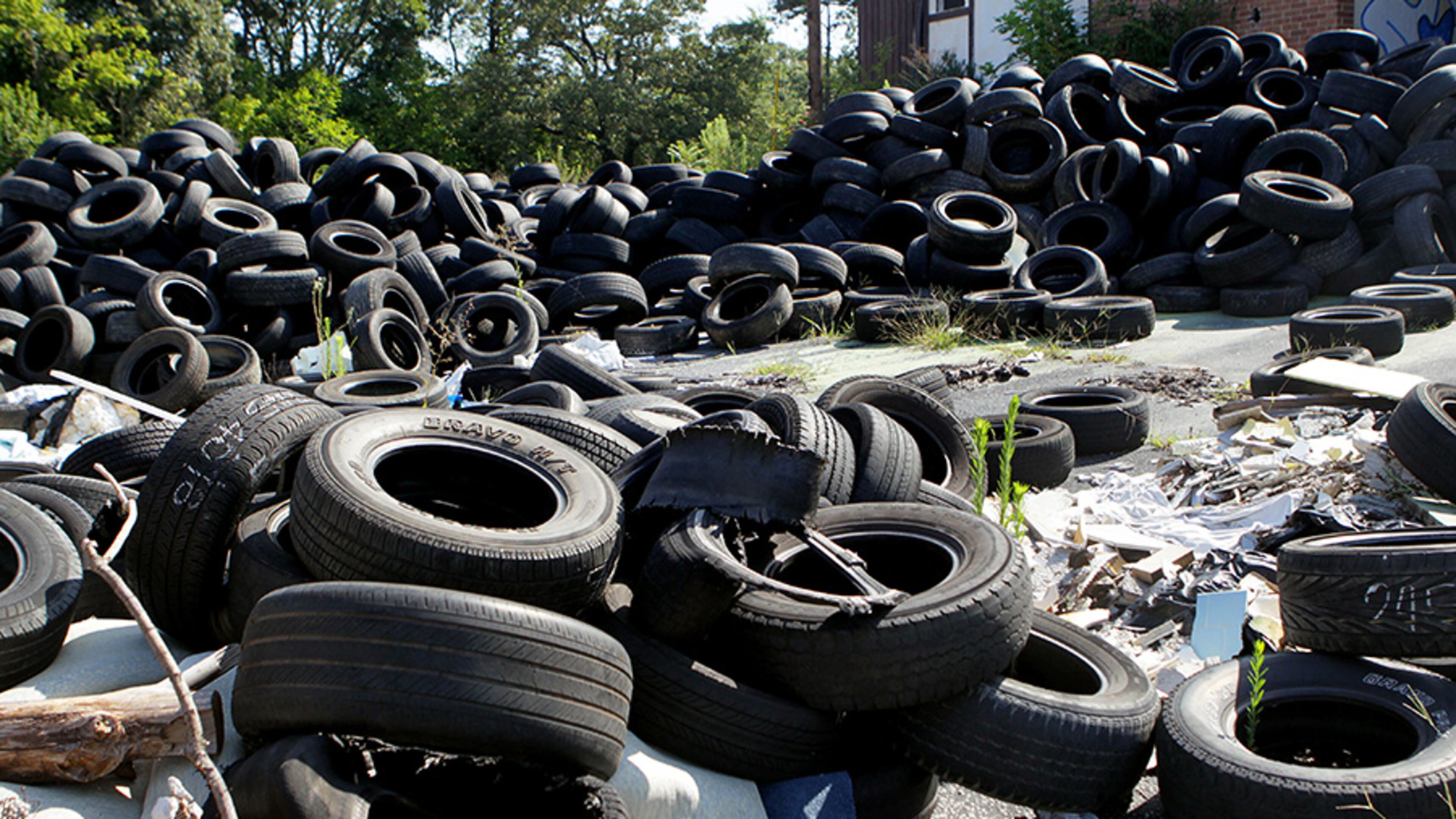 A file photo of scrap tires is shown. Georgia utility regulators recently changed the definition of approved fuels that can be burned at biomass plants to include crap tires. PHIL SKINNER / PSKINNER@AJC.COM
