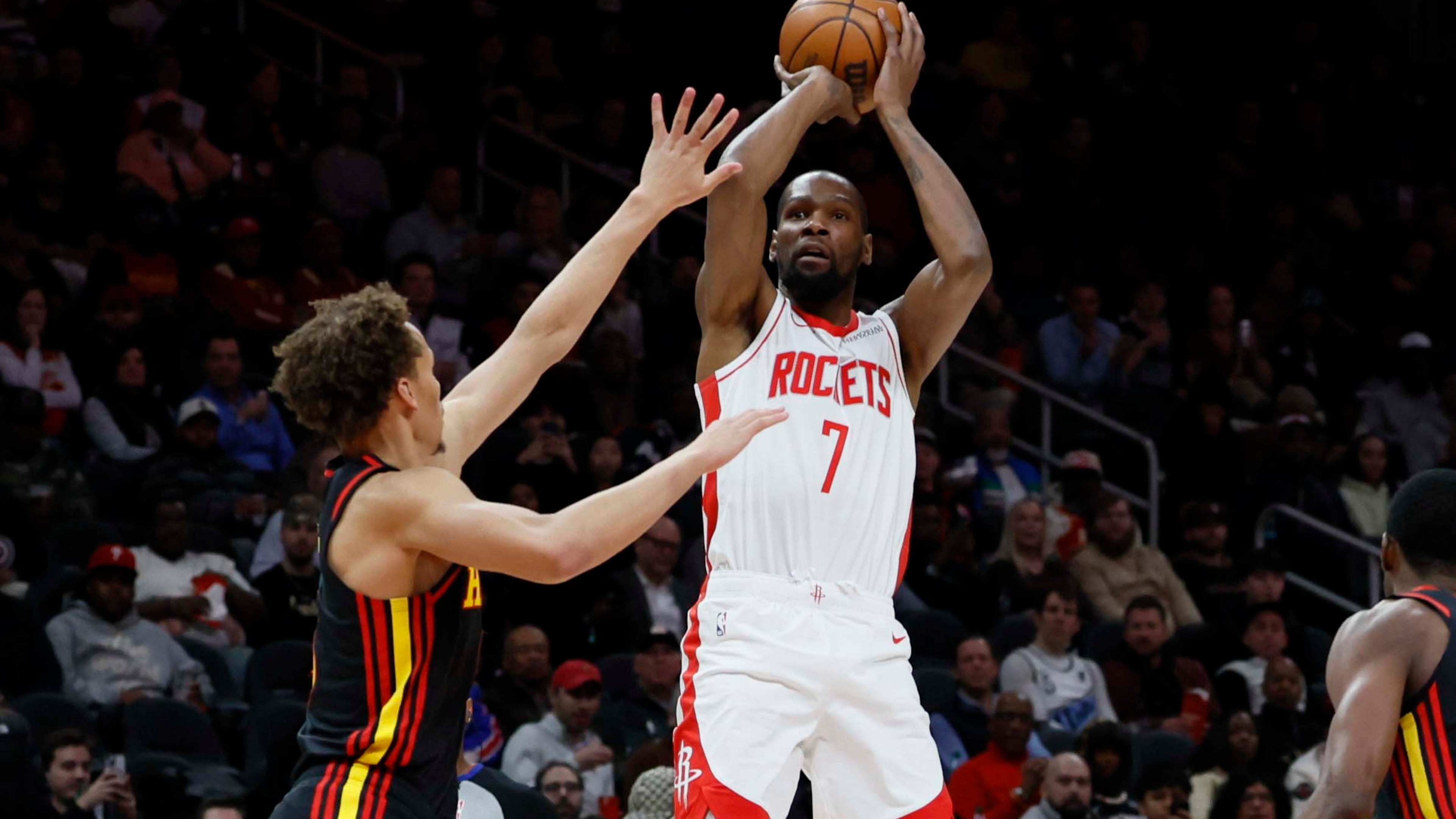 Houston Rockets forward Kevin Durant goes up for a basket against Atlanta Hawks guard Dyson Daniels during the first half of an NBA basketball game, Thursday, Jan. 29, 2026, in Atlanta. (Miguel Martinez/AJC)