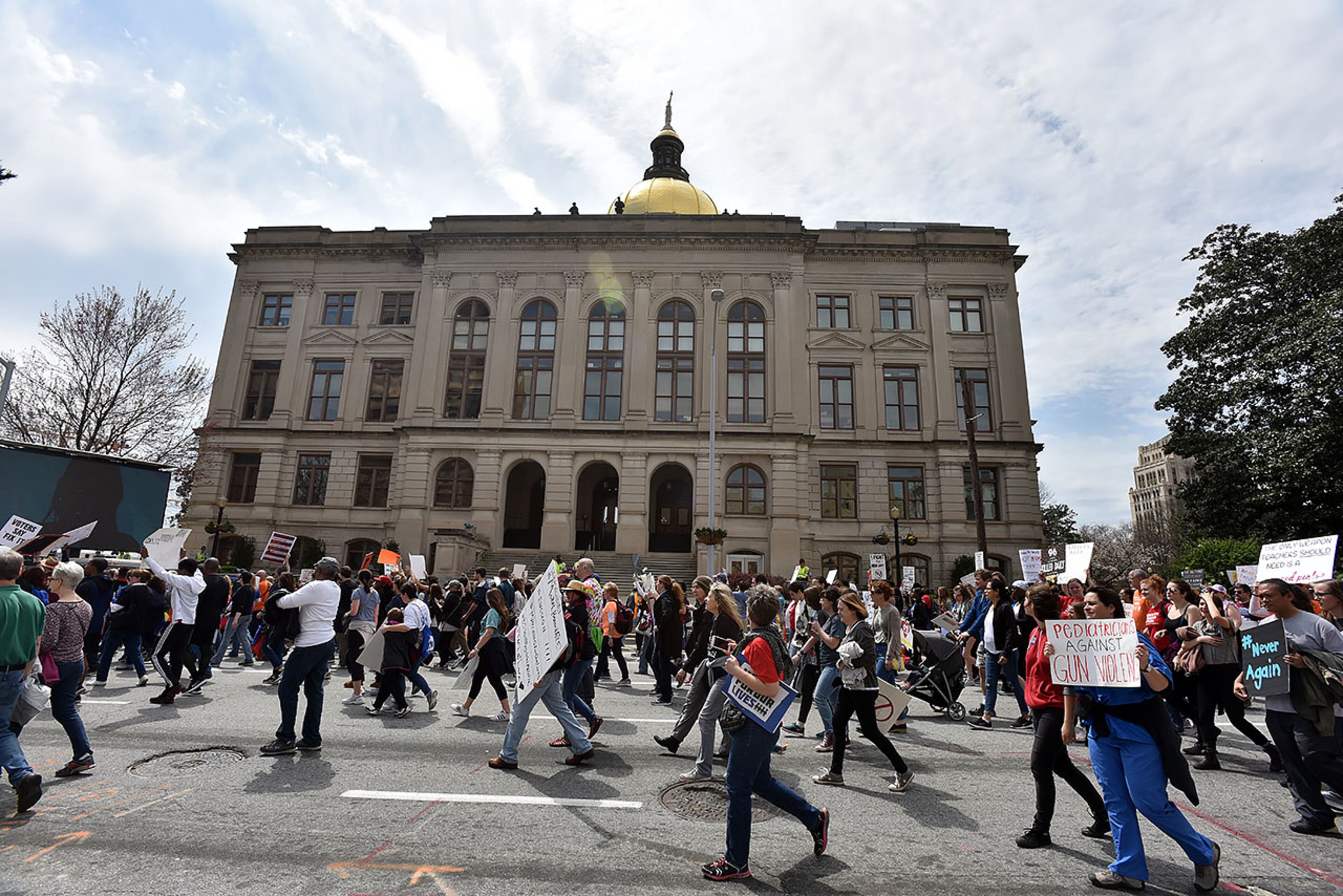 March 24, 2018 Atlanta - Thousands of people march to Liberty Plaza during the March For Our Lives rally in downtown Atlanta on Saturday, March 24, 2018. Atlanta police estimated the crowd at near 30,000 for todayâÃôs March for Our Lives. People of all ages were drawn to one of the nationwide demonstrations in a movement begun by student survivors of last monthâÃôs mass killing in a Parkland, Fla., school. Some of those Florida students were among the speakers in Atlanta. HYOSUB SHIN / HSHIN@AJC.COM