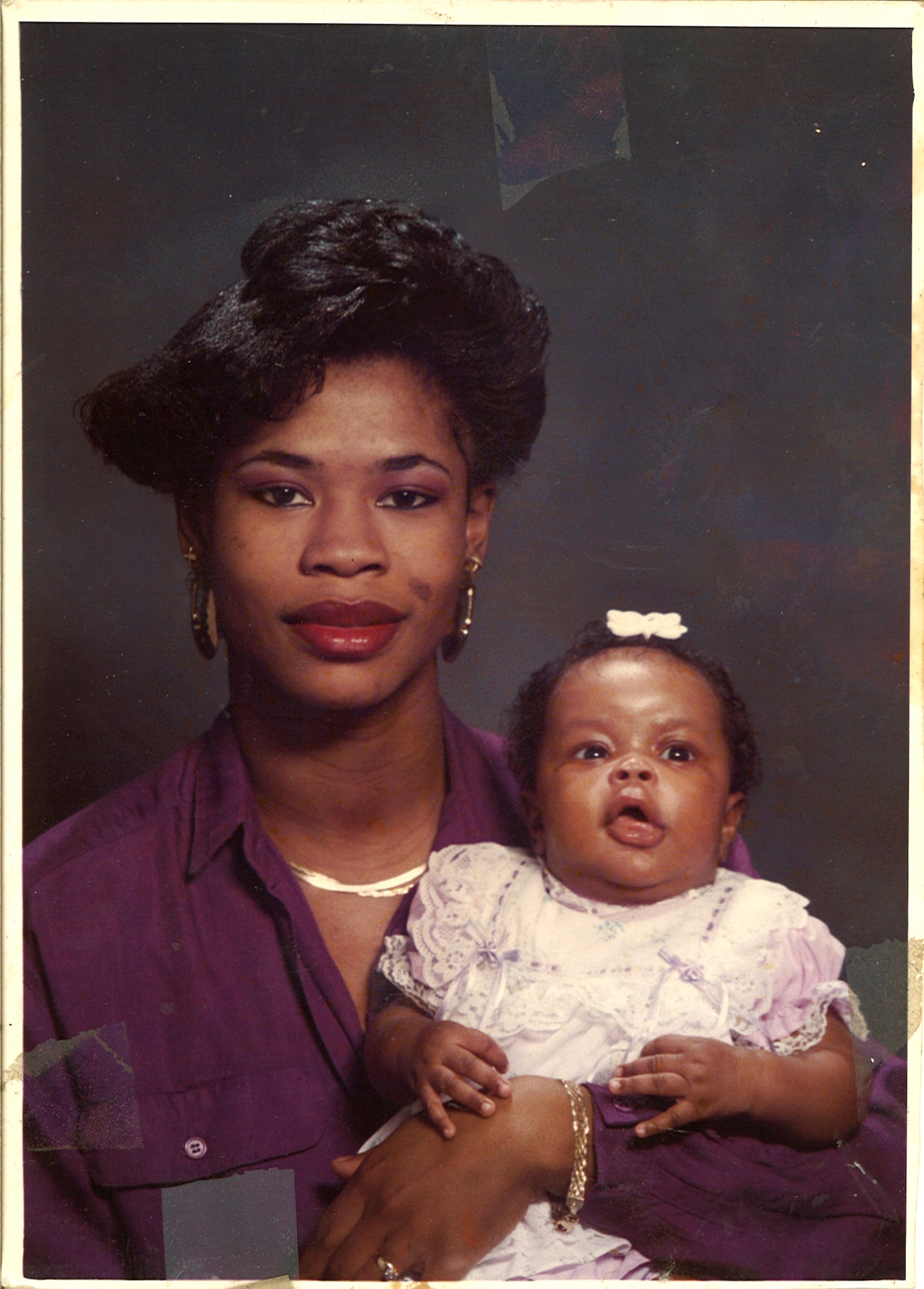 Donna, happy as a new mother, holds baby Kendra in early 1989. All Donna ever wanted, she said, was to be a mother of a big family.