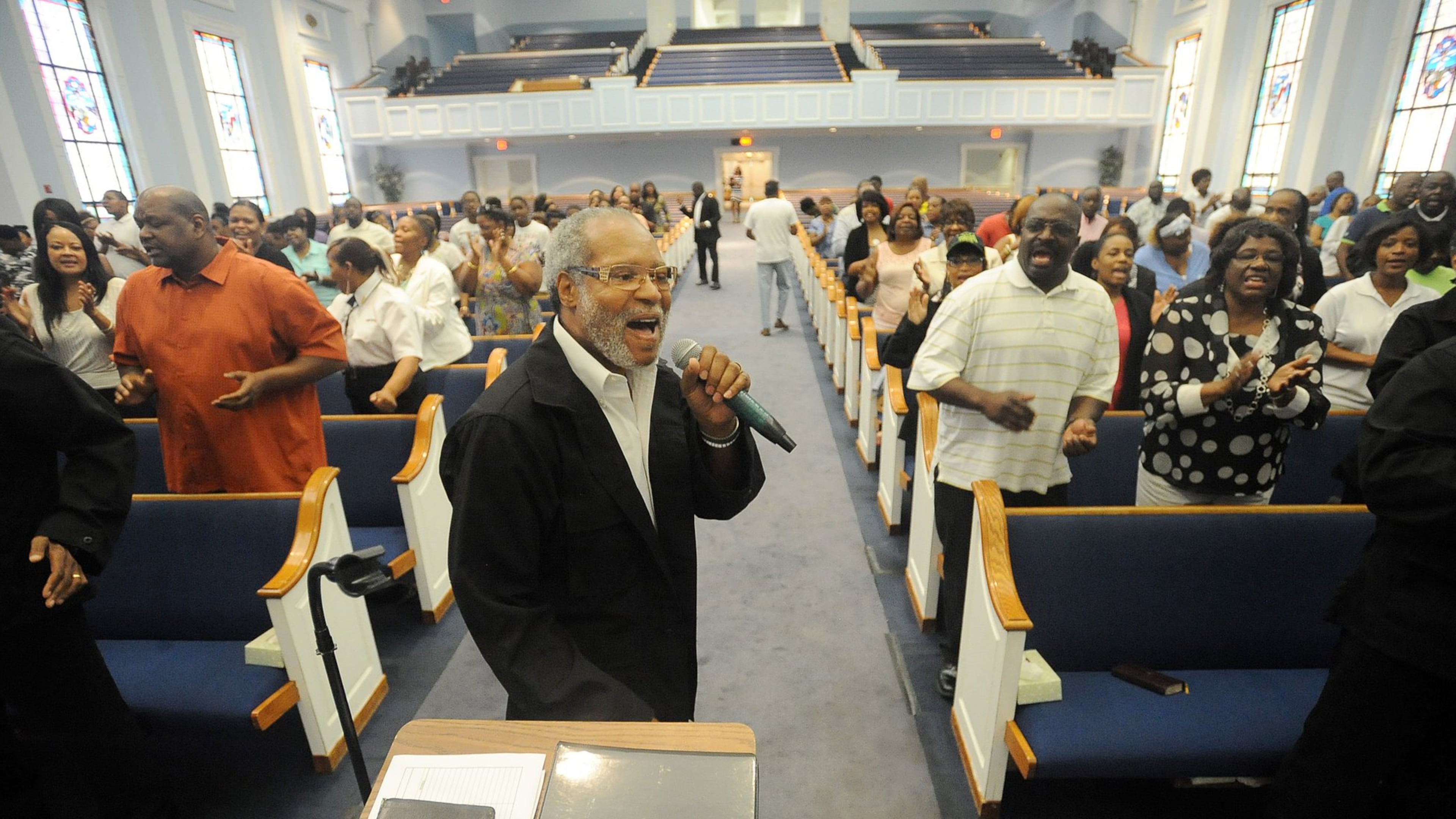 Minster Thomas Taylor sings as Hopewell Missionary Baptist Church holds a town hall meeting against gay marriage in Norcross, Friday, June 26, 2015. In a 5-4 ruling, the U.S. Supreme Court ruled Friday that the Constitution requires states to license same-sex marriage and to recognize same-sex marriages lawfully performed elsewhere. KENT D. JOHNSON /KDJOHNSON@AJC.COM