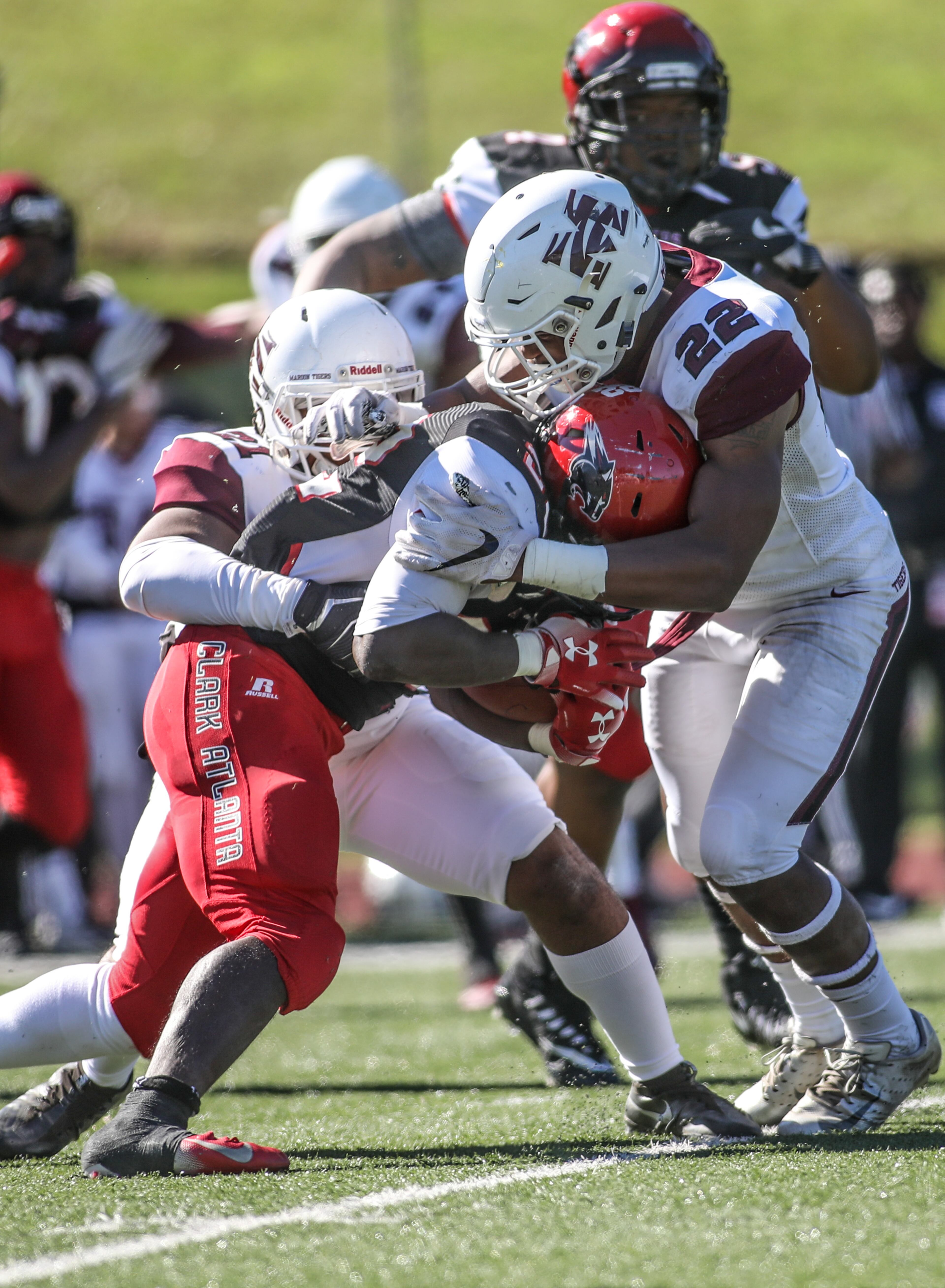 Clark Atlanta Panthers running back Roger Thomas (22) is tackled during a college football game against the Morehouse Maroon Tigers, Saturday, Nov. 3, 2018, in Atlanta. BRANDEN CAMP/SPECIAL