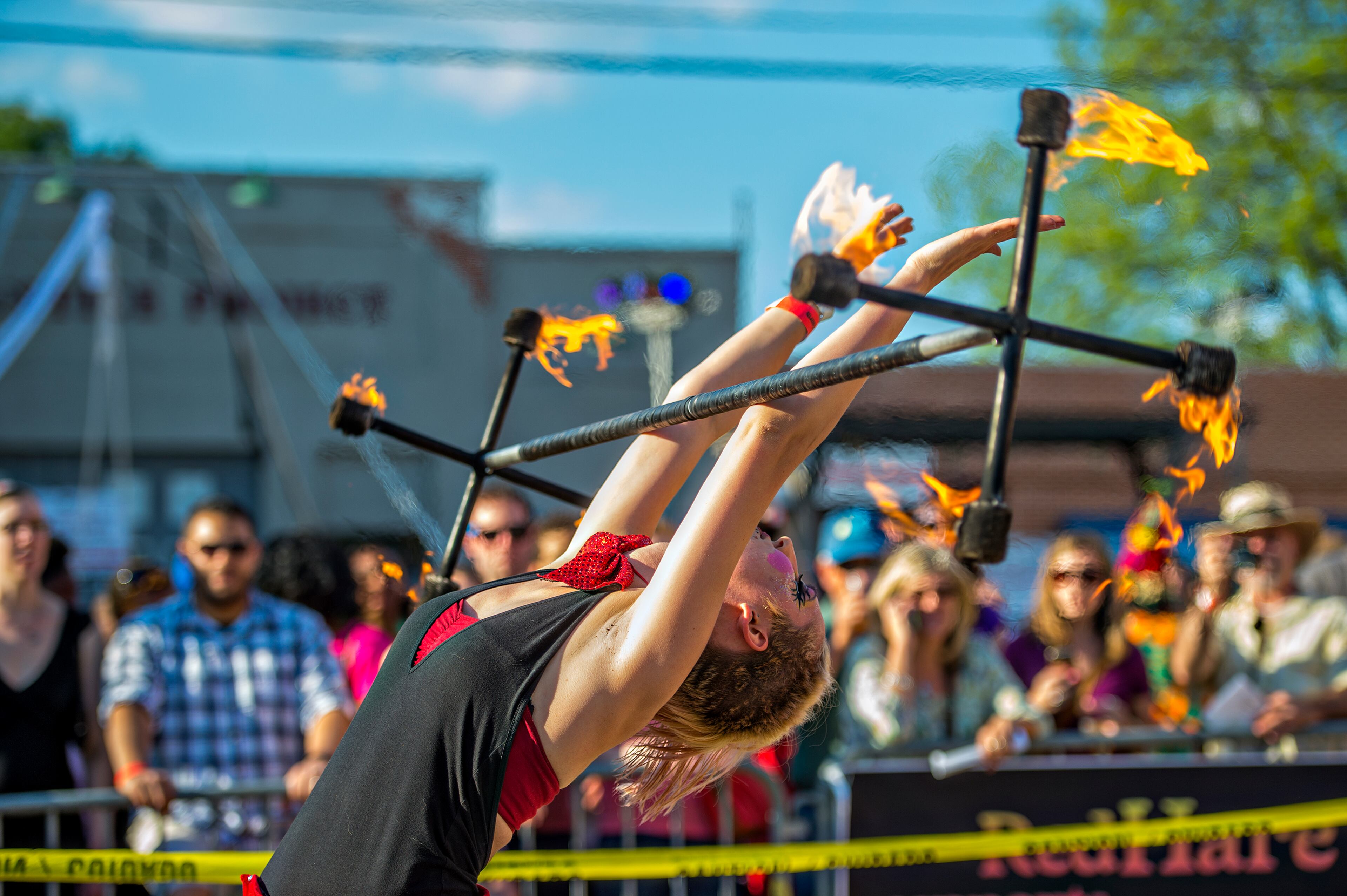 Charlotte Dillard performs with fire during the Fire in the Fourth Festival in the Old Fourth Ward neighborhood of Atlanta on Saturday, May 2, 2015. The first annual festival featured a live musical and fire performances, firefighter muster relays, and aerial acrobatics by the Imperial Opa Circus. JONATHAN PHILLIPS / SPECIAL