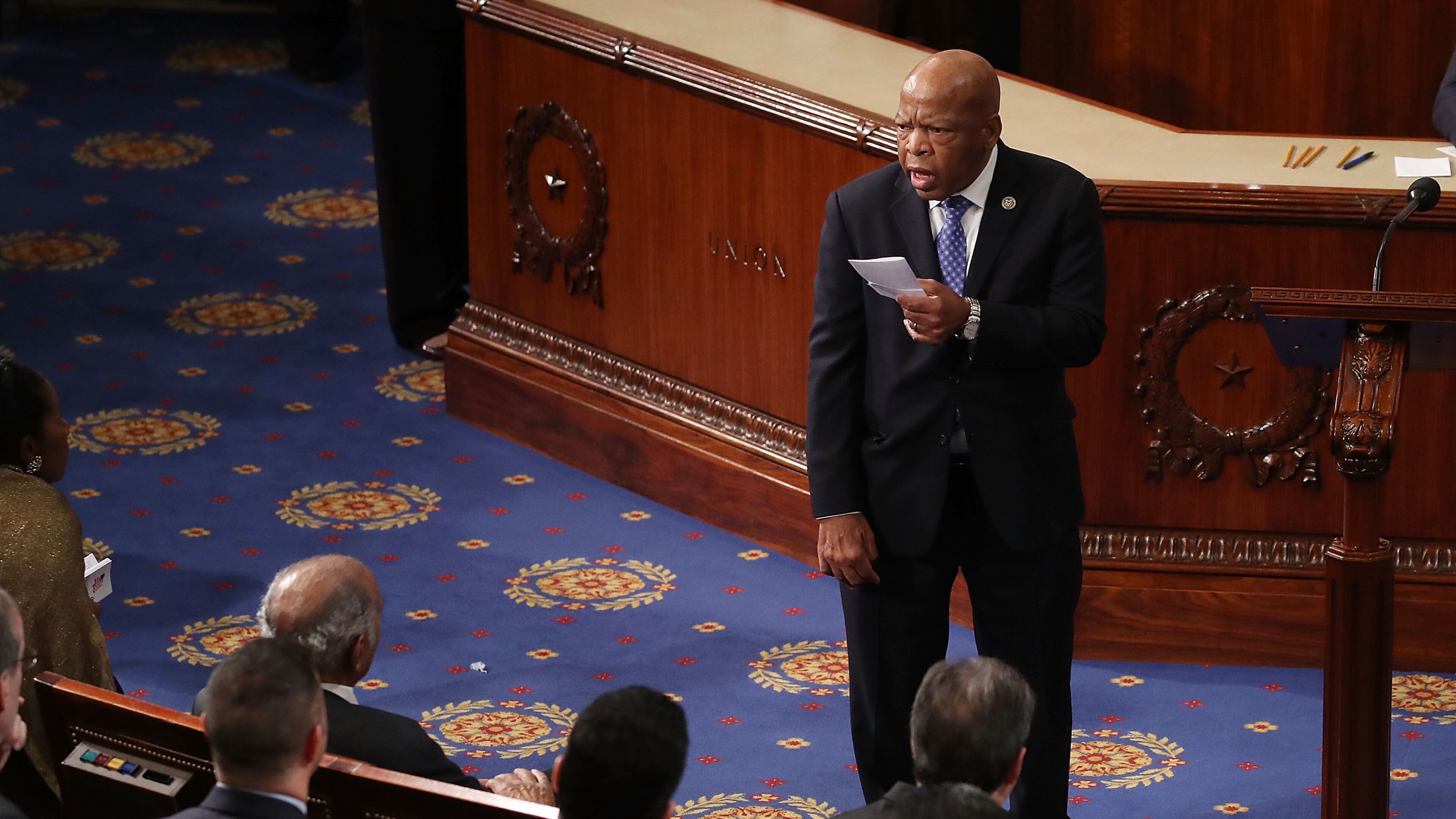U.S. Rep. John Lewis (D-GA), reads a statement in the House chamber on Jan. 3, 2017. (Photo by Mark Wilson/Getty Images)