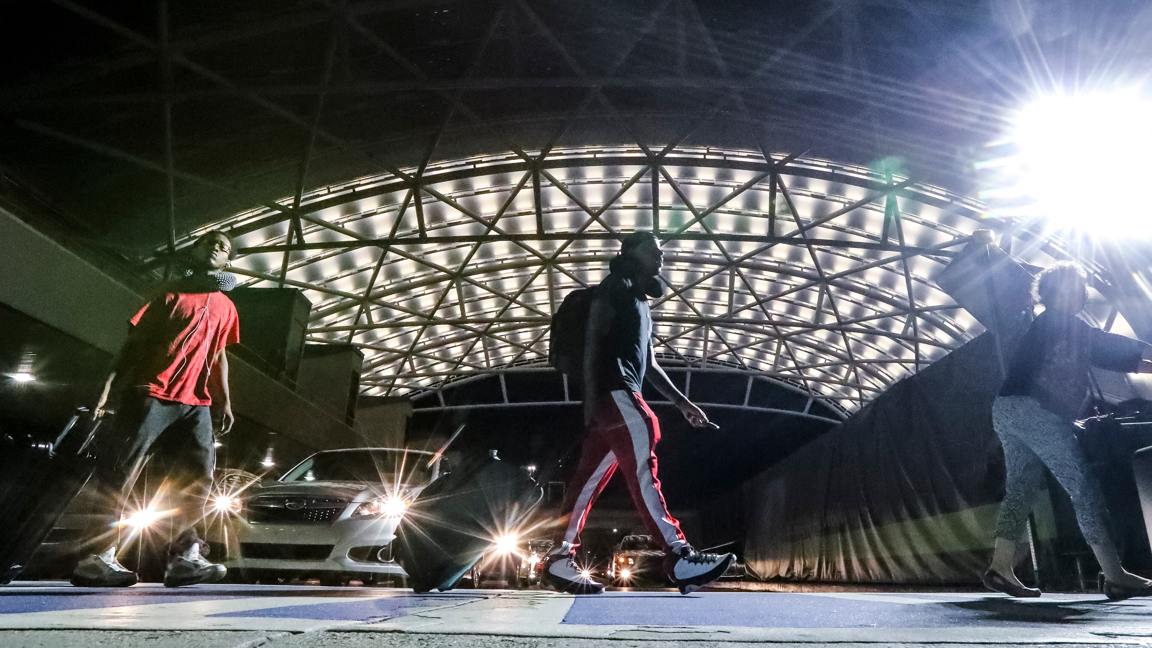 August 16, 2018 Hartsfield-Jackson: Hartsfield-Jackson International Airport tested the lighting system on a massive canopy under construction at the domestic terminal curbside from Wednesday night into Thursday morning August 16, 2018. The Atlanta airport continued construction of the first of two canopies at the domestic terminal. The Terminal North canopy is under construction and expected to be completed this fall, and the airport began testing nearly 1,000 lights on the canopy Wednesday evening at 11:05 p.m. The test involved cycling through a dozen color combinations, according to the airport, which said it is a partial display of what is expected to become the next architectural icon for the City of Atlanta. The canopies and other terminal improvements are part of a $265 million construction contract, including work on the canopies, vestibules and terminal exterior, and other work inside the terminal and on the roof. When the canopies are complete in fall 2019, there will be more than 3,600 lights diffused through a plastic canopy. The canopy could be lit in different colors for special occasions such as red and black for a Falcons victory, green for Earth Day, or red white and blue for Independence Day, the airport said. JOHN SPINK/JSPINK@AJC.COM