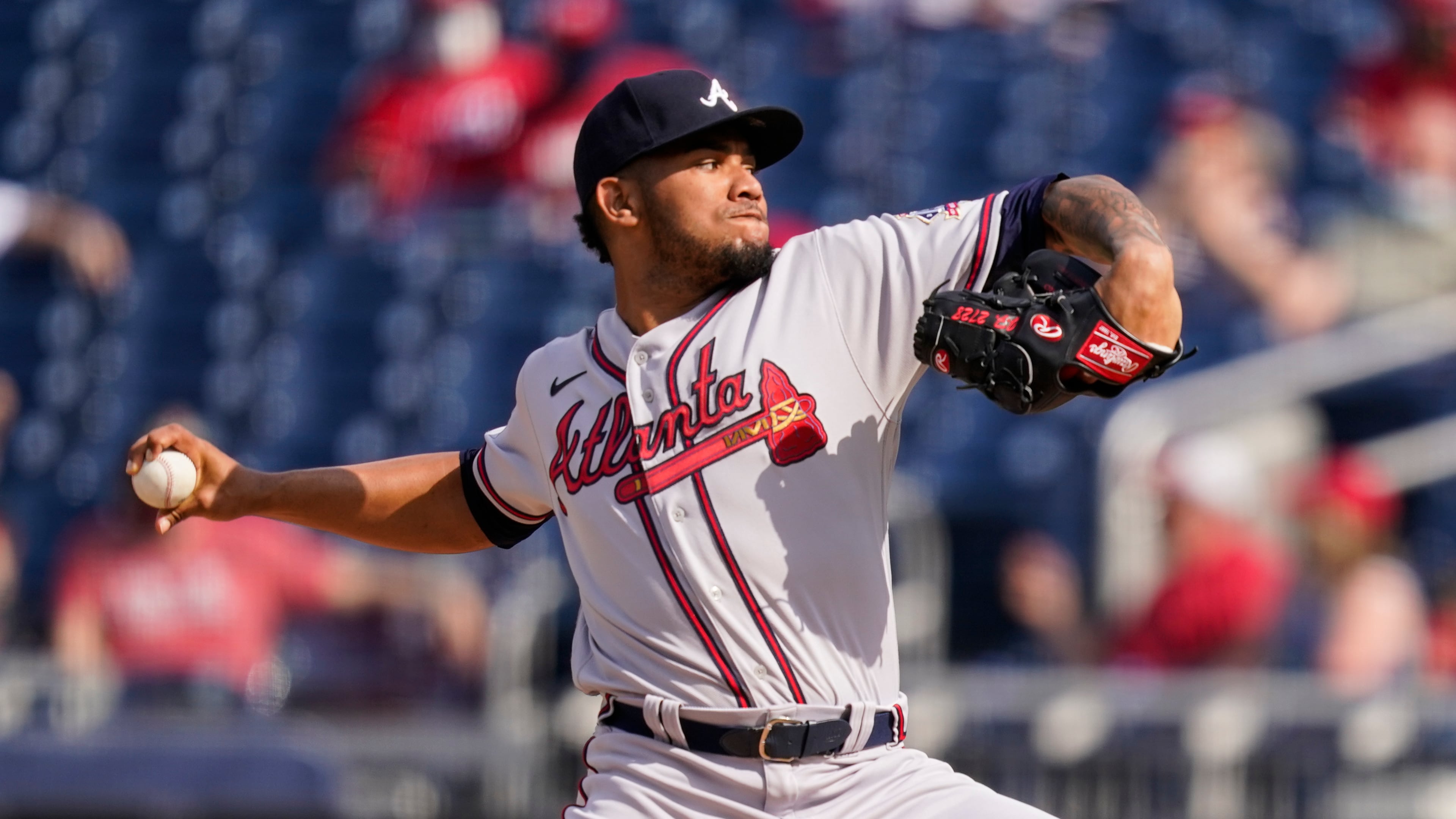 Atlanta Braves starting pitcher Huascar Ynoa throws during the first inning of the second baseball game of a doubleheader against the Washington Nationals, at Nationals Park, Wednesday, April 7, 2021, in Washington. (AP Photo/Alex Brandon)
