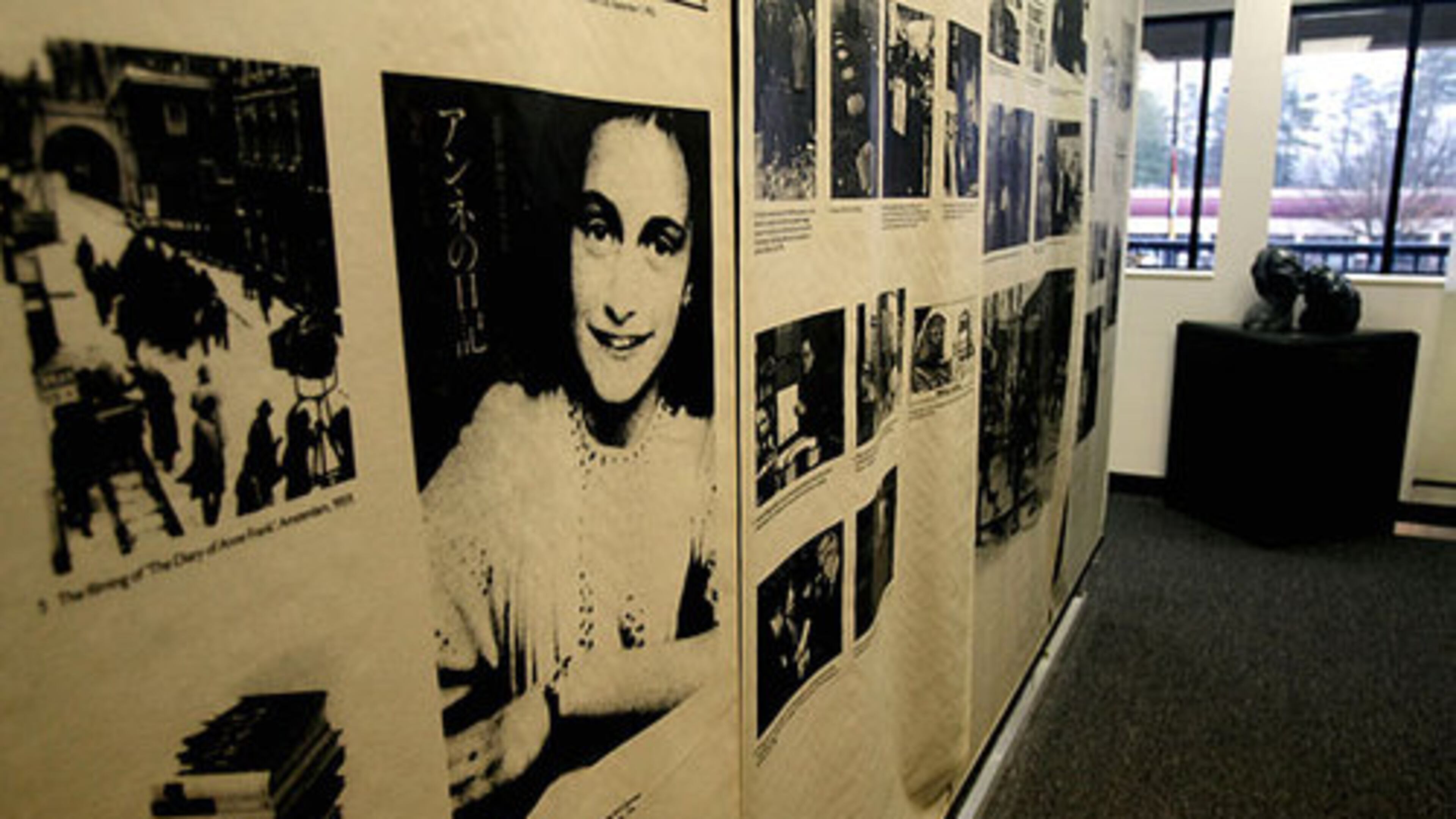 Giant banners in a room at the Anne Frank in the World exhibit that was held at Parkside Shopping Center in Sandy Springs before the pandemic. Credit: Phil Skinner
