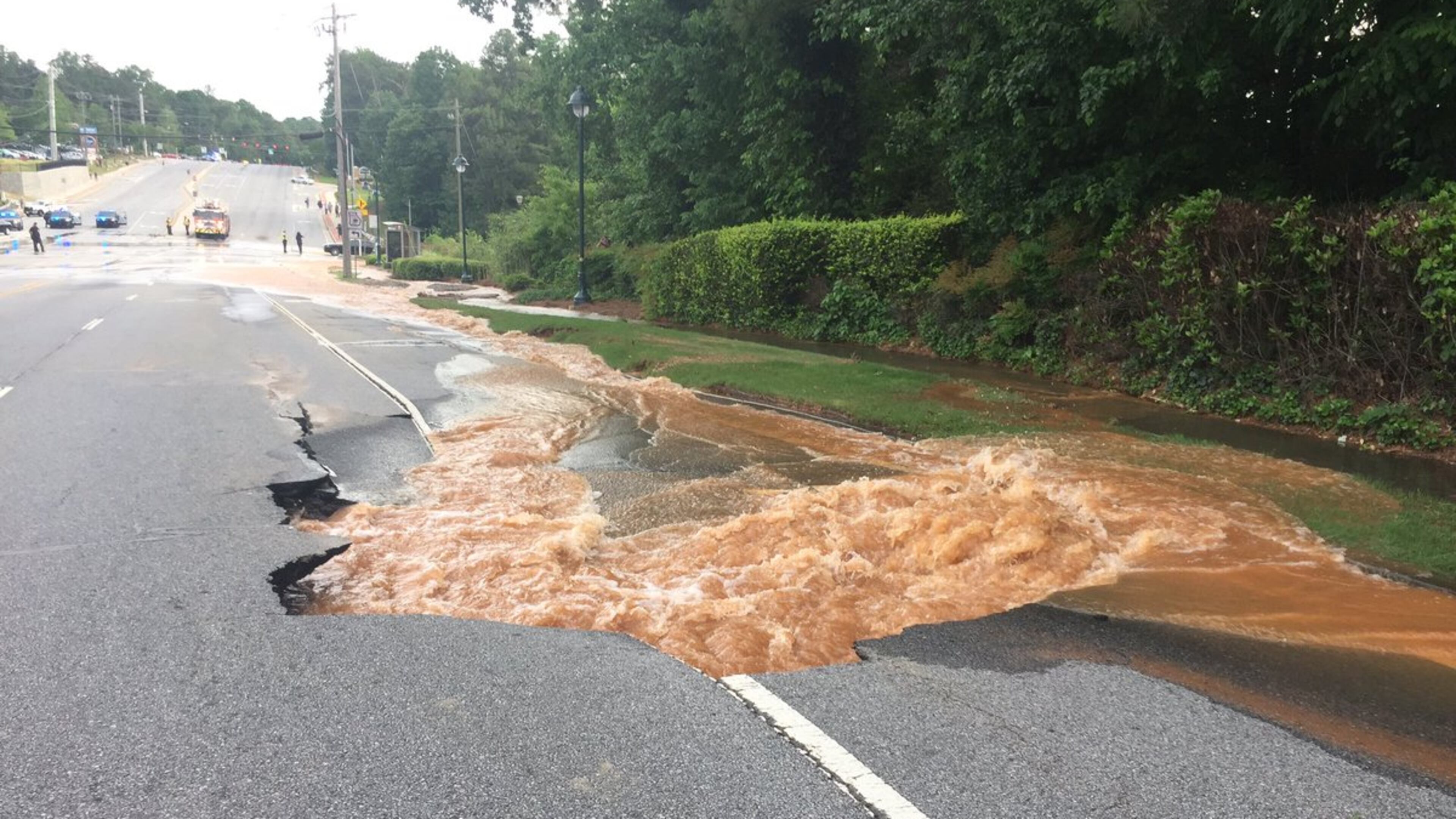 A water main break in Sandy Springs closed Roswell Road. (Credit: Channel 2 Action News)