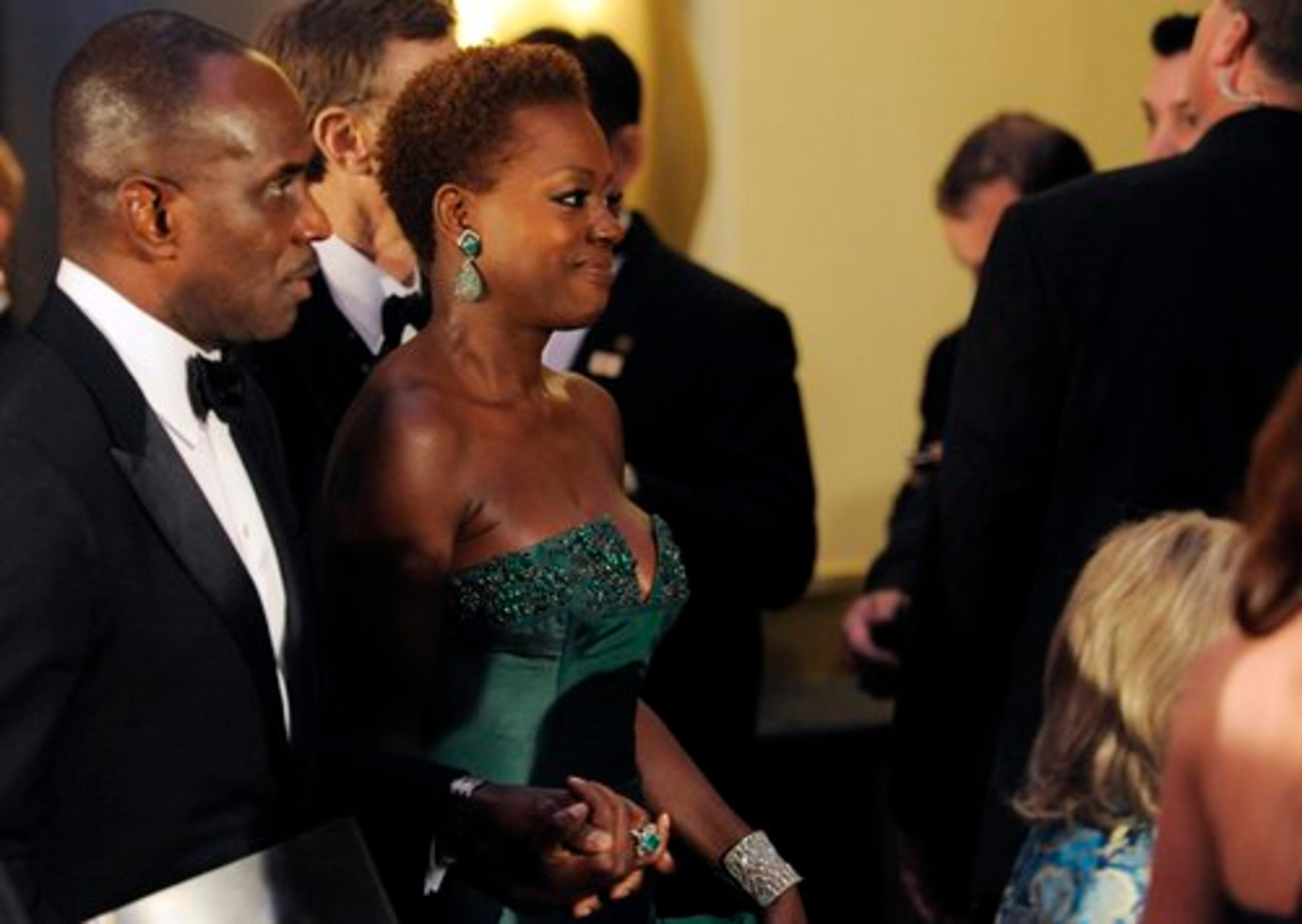 Best actress nominee Viola Davis and Julius Tennon (left) make their entrance at the Governors Ball.