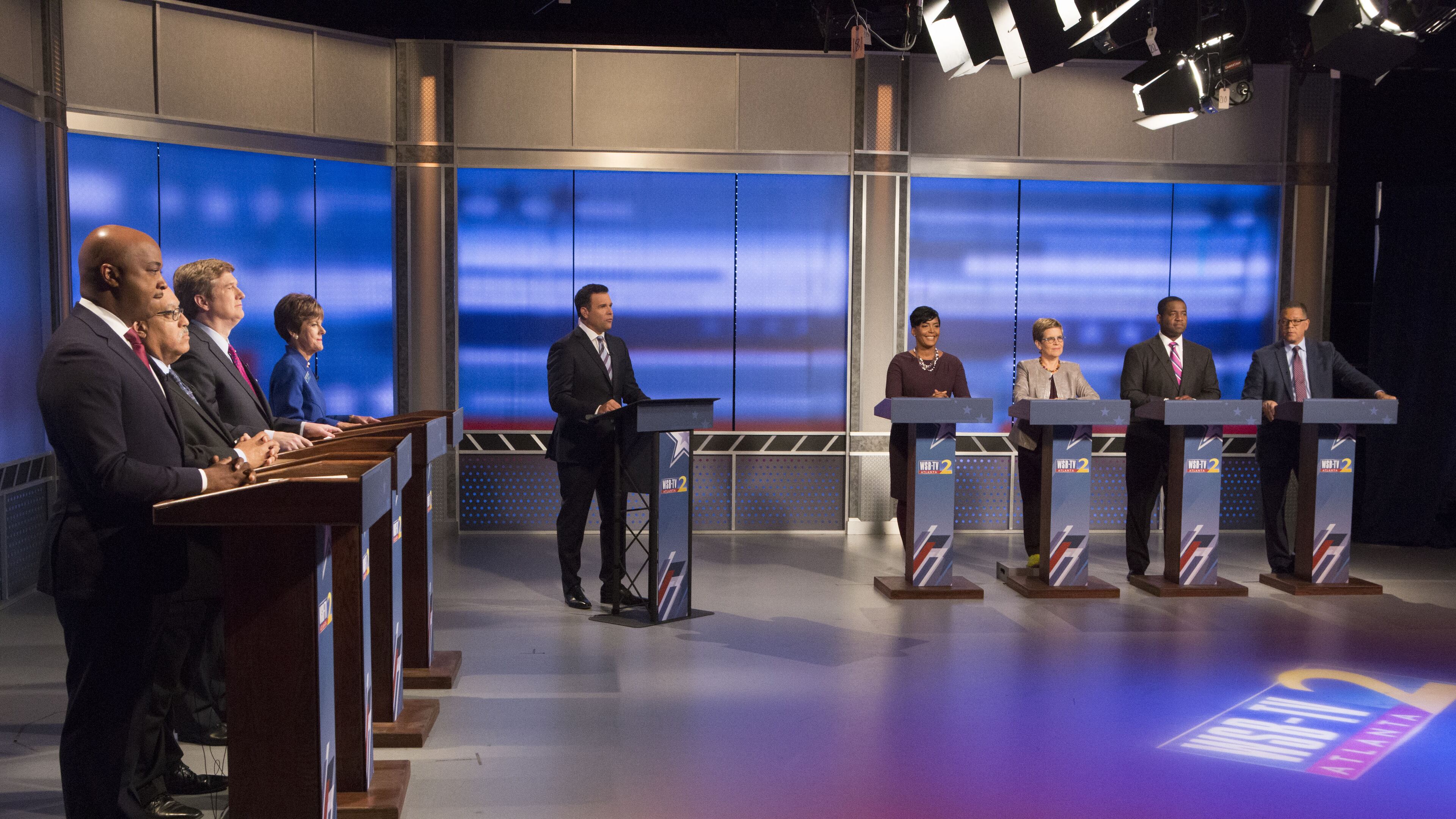 Eight of the top candidates for mayor sparred Sunday at a debate held by WSB-TV. The candidates on the left side are: Councilman Kwanza Hall, former state Sen. Vincent Fort, former city Chief Operating Officer Peter Aman, City Councilwoman Mary Norwood. The candidates from right to center are: former Fulton County Commission Chairman John Eaves, City Council President Ceasar Mitchell, former Council President Cathy Woolard and City Councilwoman Keisha Lance Bottoms. Channel 2 Action News Anchor Justin Farmer moderated. Photo by Phil Skinner
