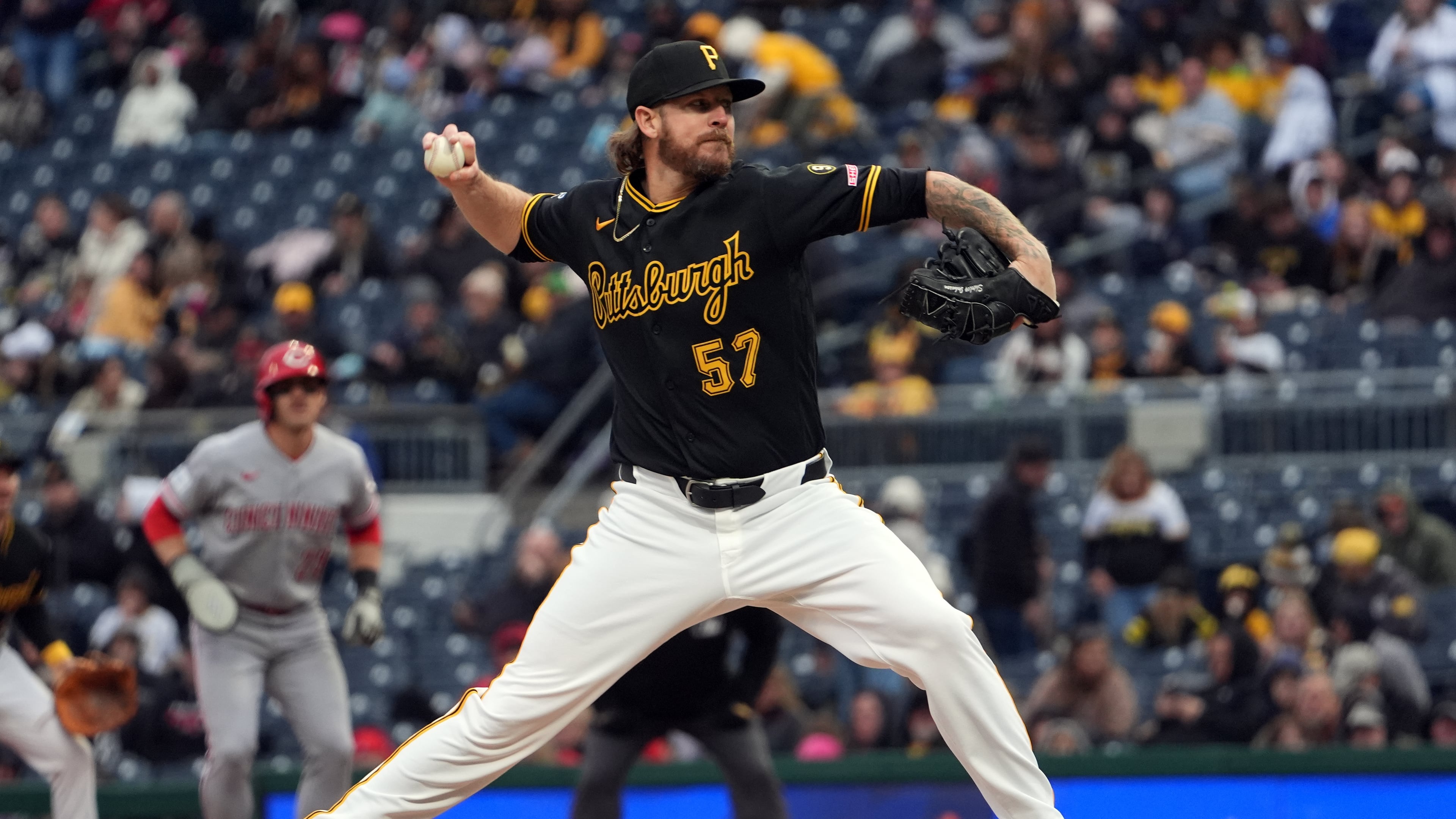 FILE - Pittsburgh Pirates pitcher Chris Devenski deliver a pitch against the Cincinnati Reds in the sixth inning of a baseball game in Pittsburgh, Saturday, May 2, 2026. (AP Photo/Tom E. Puskar, File)