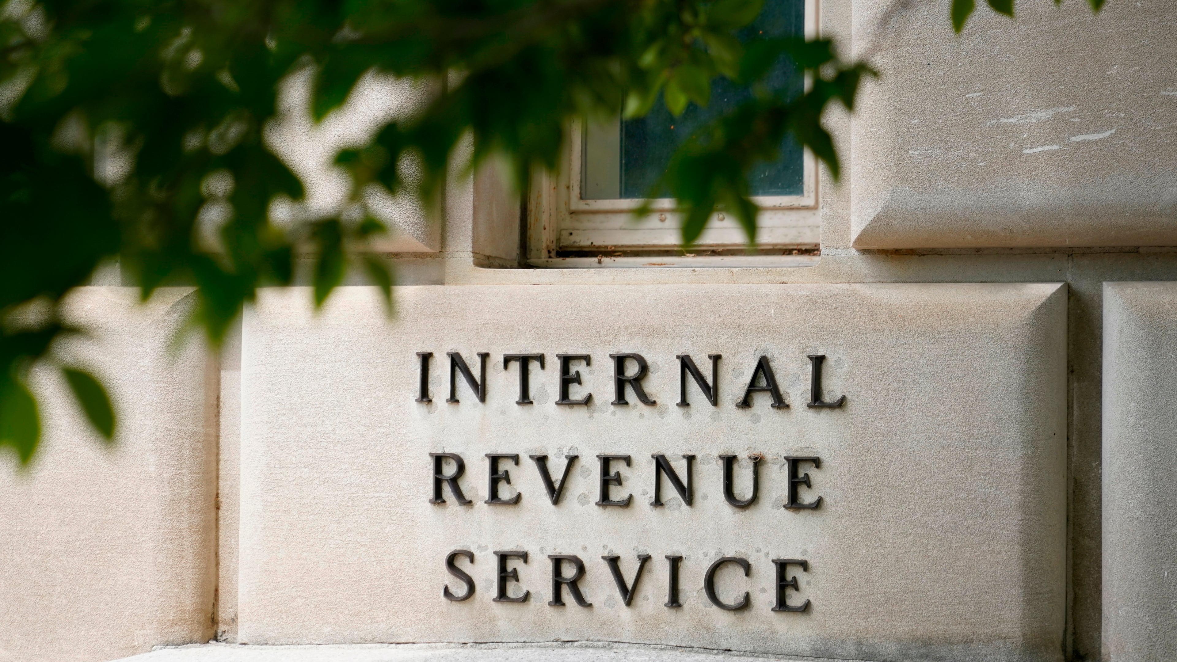 FILE - A sign outside the Internal Revenue Service building is photographed May 4, 2021, in Washington. (AP Photo/Patrick Semansky, File)