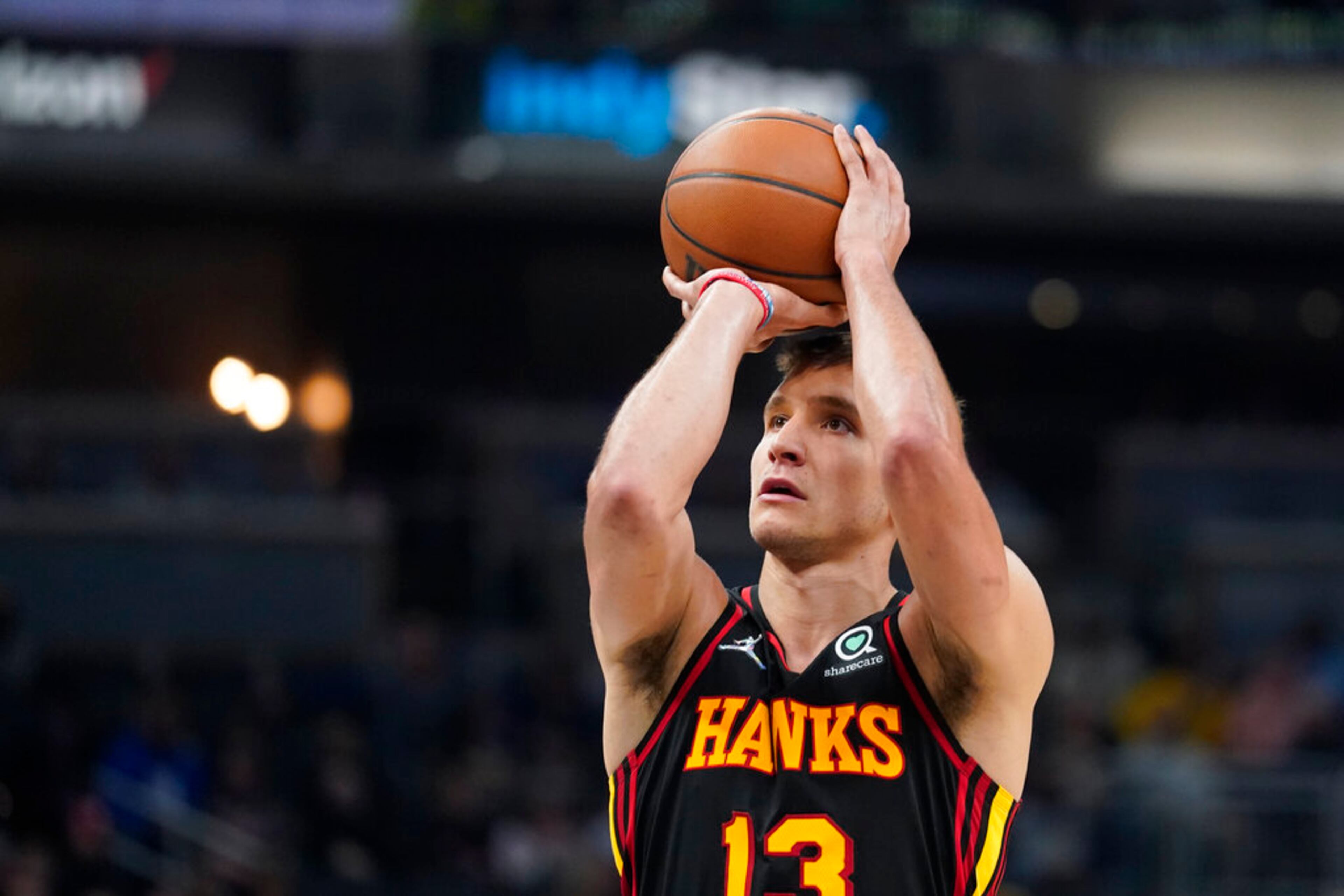 Atlanta Hawks' Bogdan Bogdanovic shoots during the first half of an NBA basketball game against the Indiana Pacers, Monday, March 28, 2022, in Indianapolis. (AP Photo/Darron Cummings)