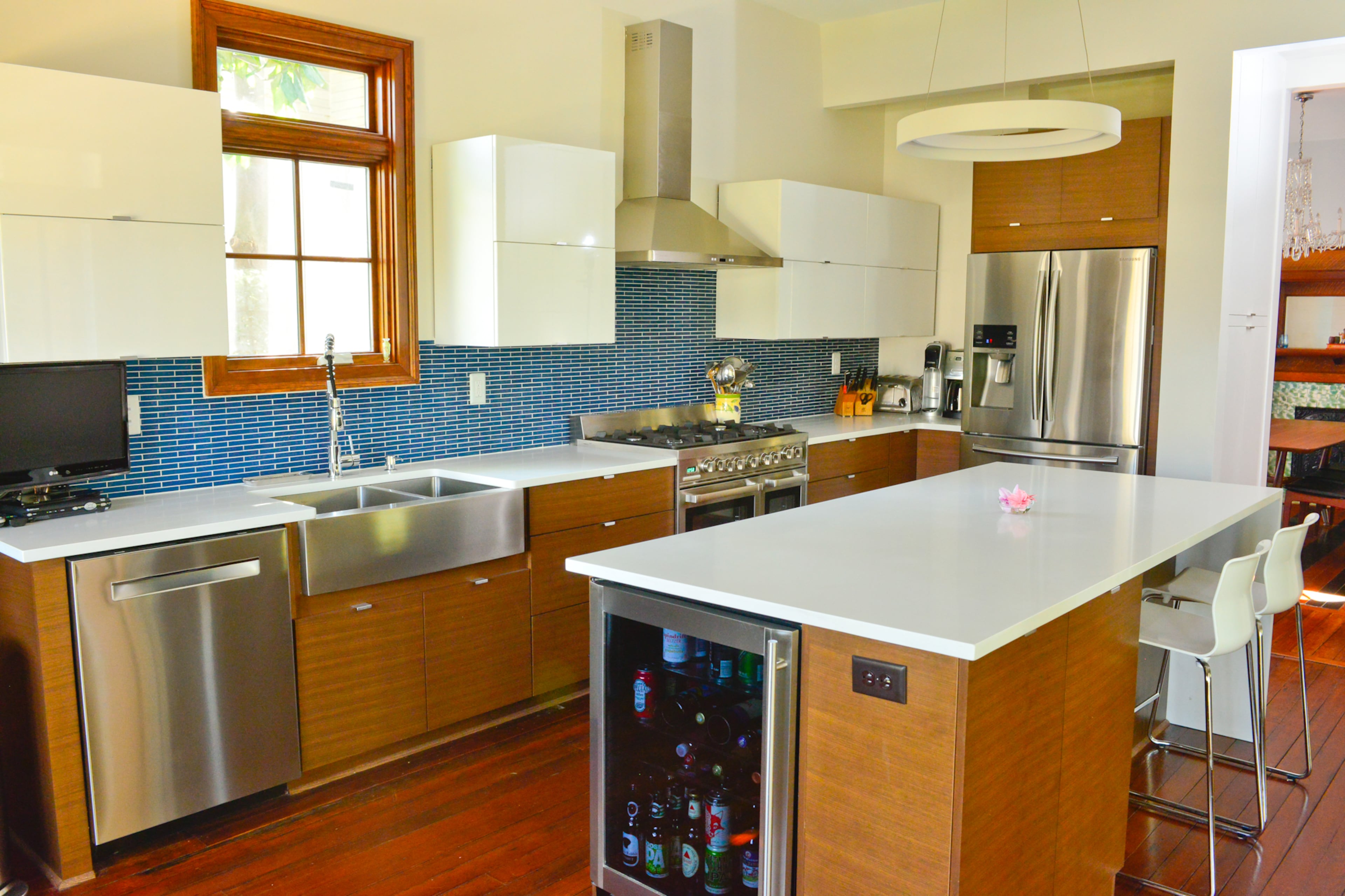The newly renovated kitchen is Bill Goodman and Karen Goeckel's favorite room, with extras such as a wine/soda chiller, microwave drawer and quartz island countertops with a waterfall edge. For their mid-century modern space, they worked with architect Adam Stillman, Ed Turner of Classic Renovators and design consultant Thea Quillian.