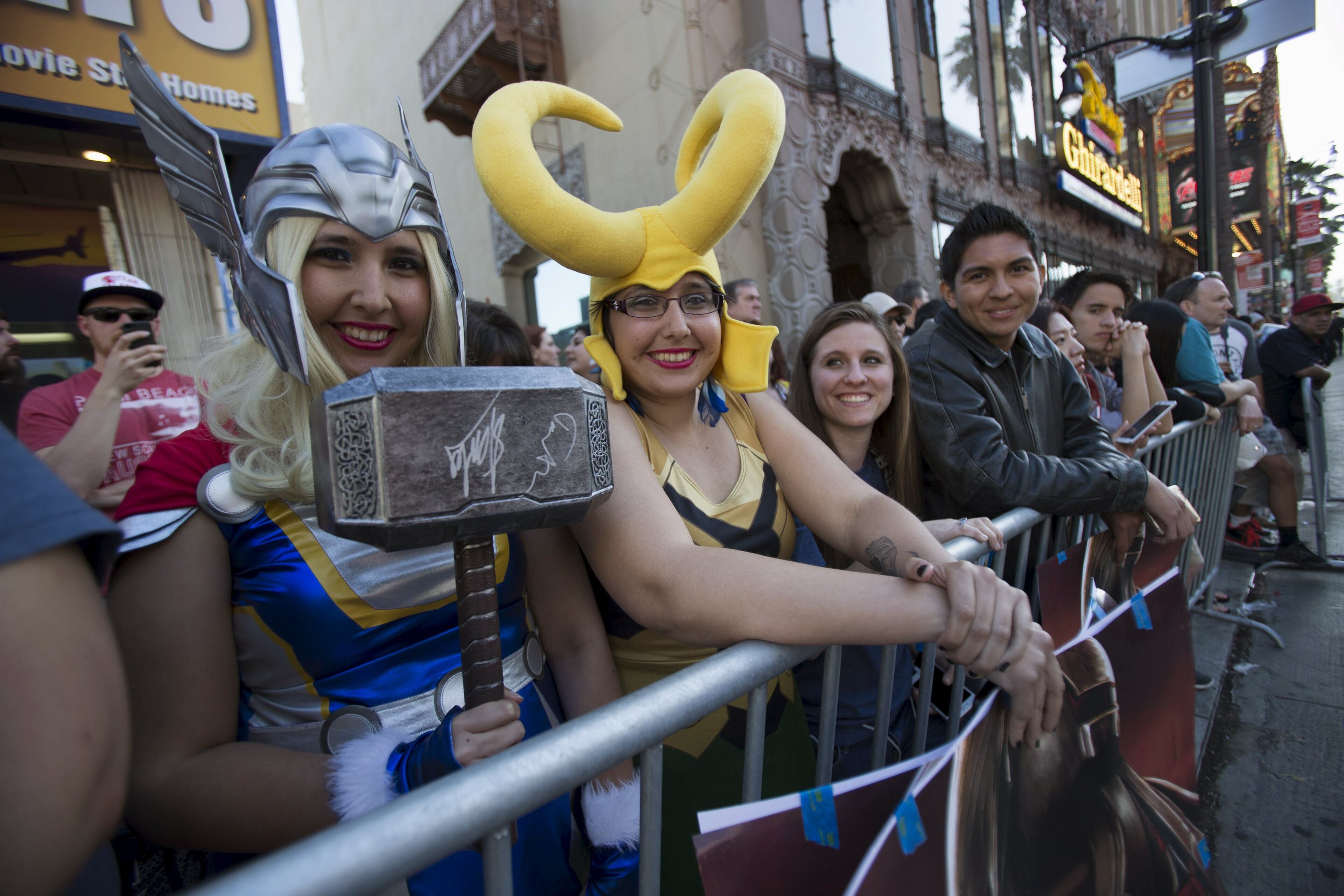 Fans Gina (L) and Luisa Gomez wait at the premiere of "Avengers: Age of Ultron" at Dolby theatre in Hollywood, California April 13, 2015. The movie opens in the U.S. on May 1. REUTERS/Mario Anzuoni