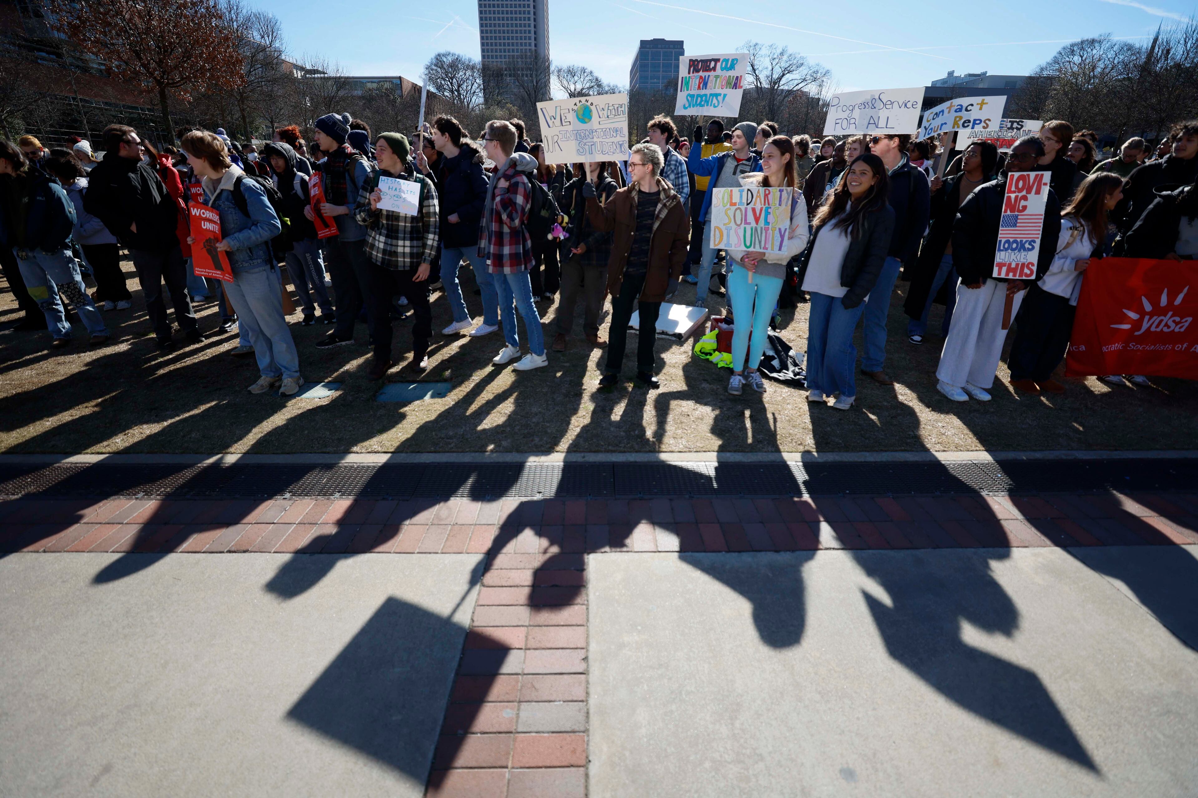 Georgia Tech students held a walkout protest at Tech Green on the main campus on Tuesday, Jan. 20, 2026. The demonstration coincided with the anniversary of Trump’s inauguration and opposed increased immigration enforcement during his administration. (Miguel Martinez/ AJC)
