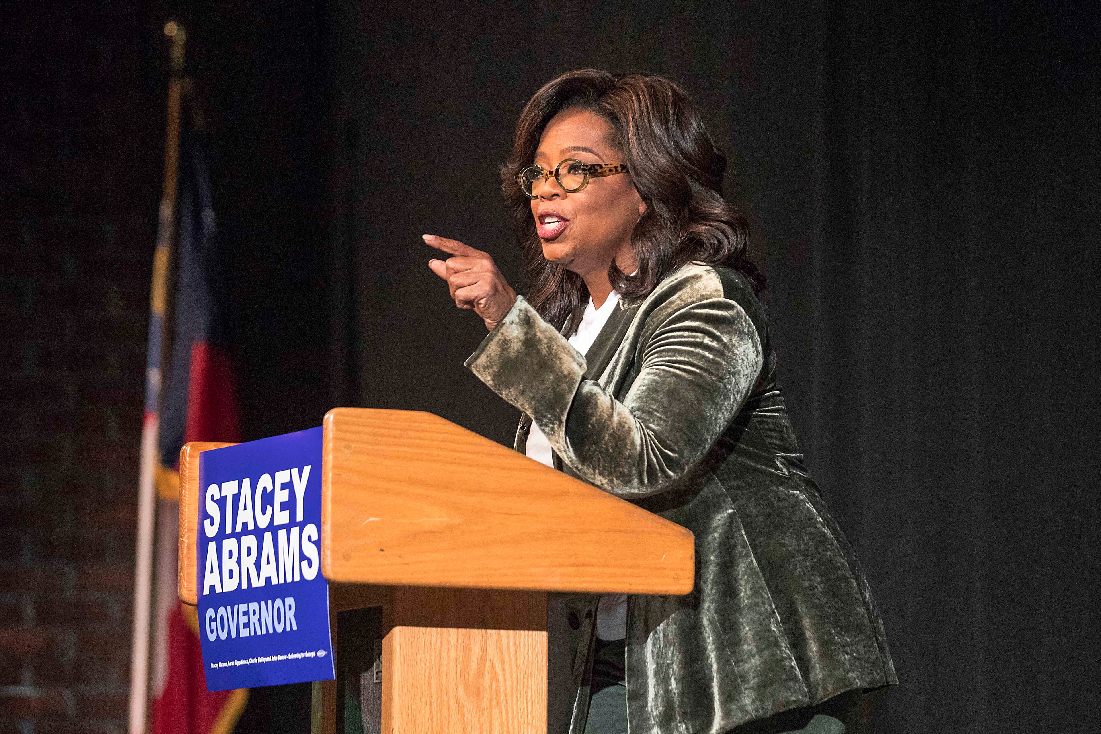 11/01/2018 -- Marietta, Georgia -- Oprah Winfrey speaks to a crowd during a town hall conversation for gubernatorial candidate Stacey Abrams at the Cobb Civic Center's Jennie T. Anderson Theatre in Marietta, Thursday, November 1, 2018. Winfrey visited Georgia on Thursday to canvass neighborhoods in Metro Atlanta and show her support for gubernatorial candidate Stacey Abrams. (ALYSSA POINTER/ALYSSA.POINTER@AJC.COM)