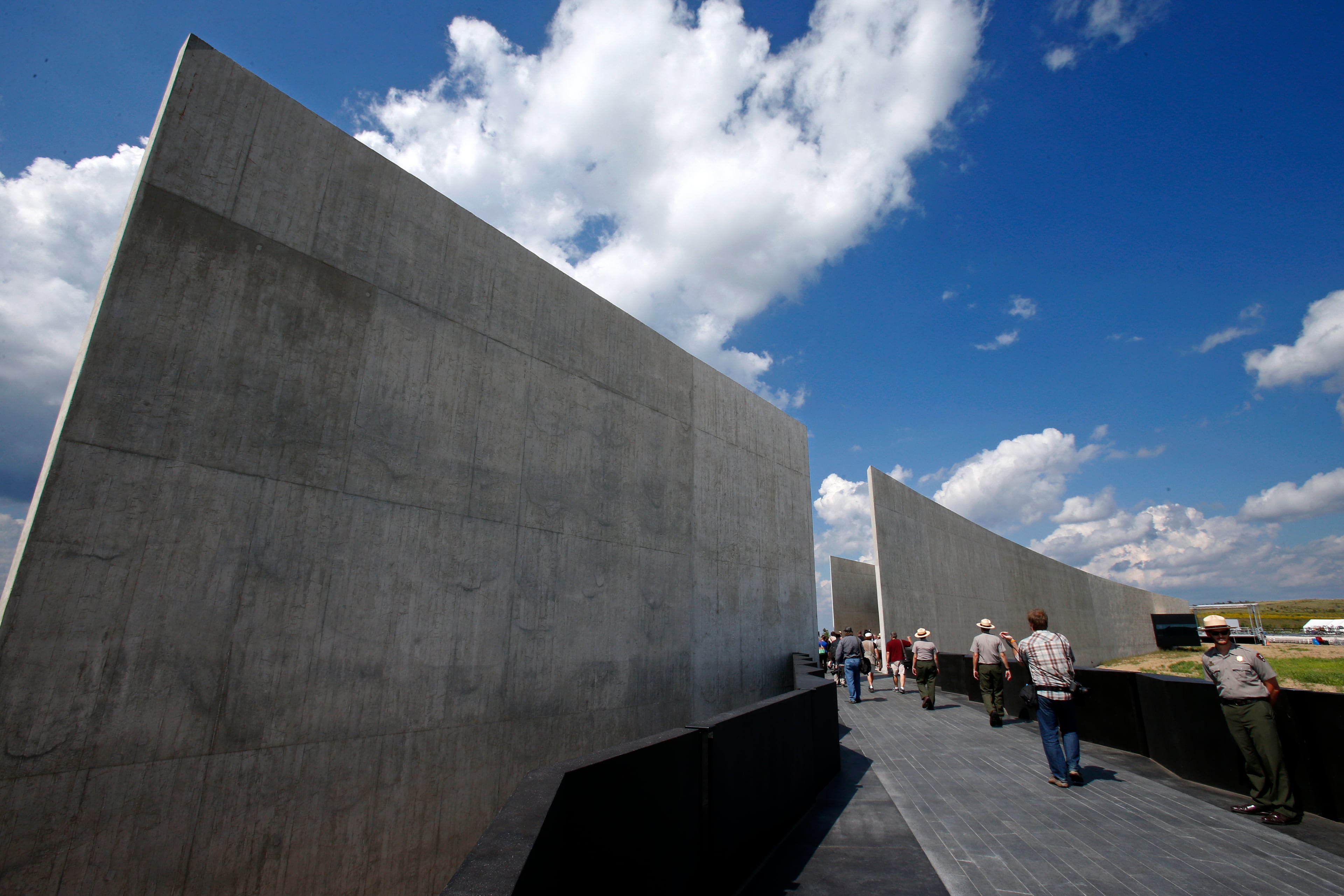 Members of the media get a preview of the the Flight 93 National Memorial visitors center complex in Shanksville, Pa, on Wednesday, Sept. 9, 2015. The visitors center will be formally dedicated and open to the public on Sept. 10, 2015. (AP Photo/Gene J. Puskar)