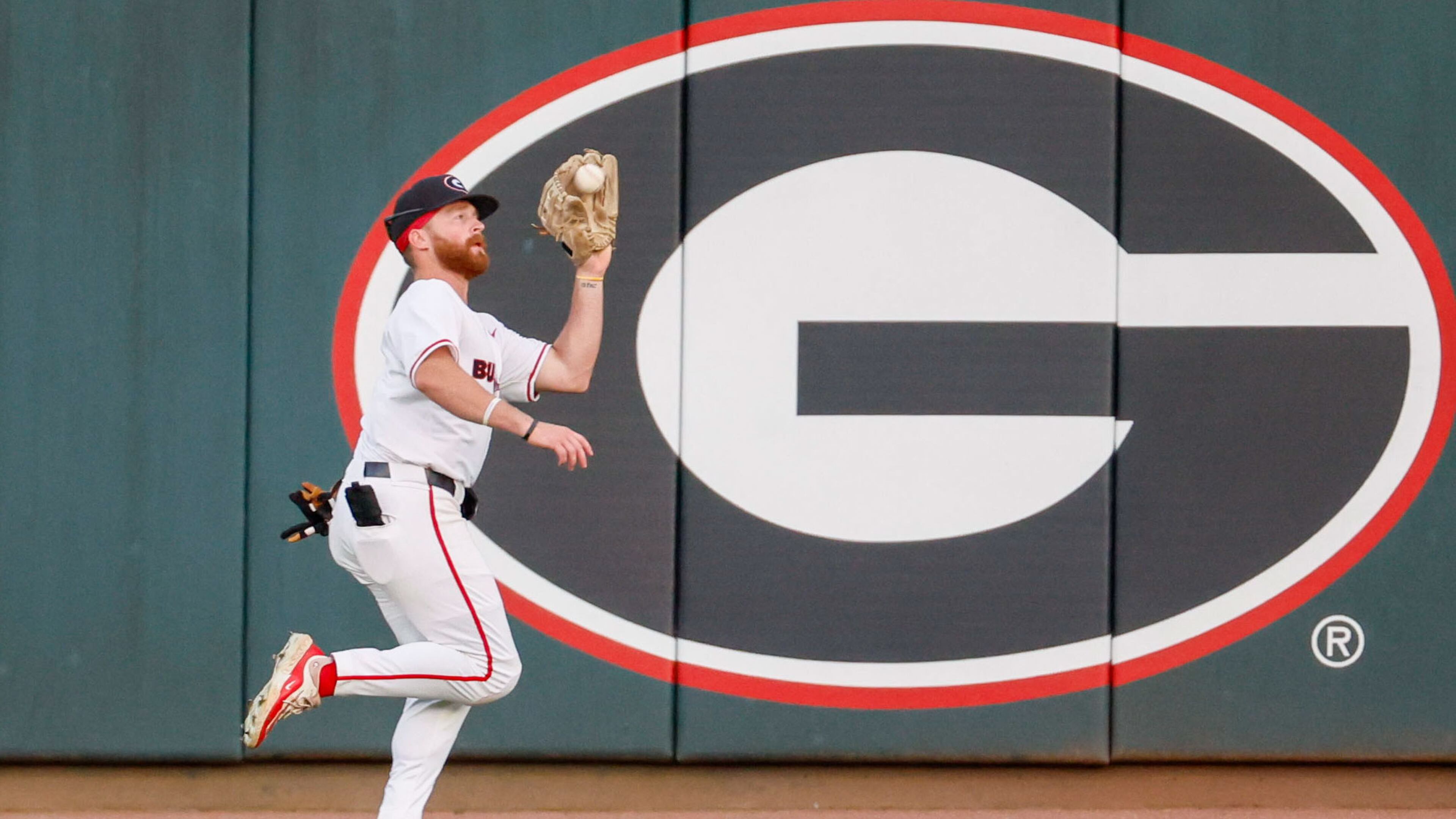 Georgia Bulldogs centerfielder Dion Carter (1) grabs a fly during the sixth inning against the Florida Gators at Foley Field on Tuesday, May 16, 2024, in Athens.
(Miguel Martinez / AJC)
