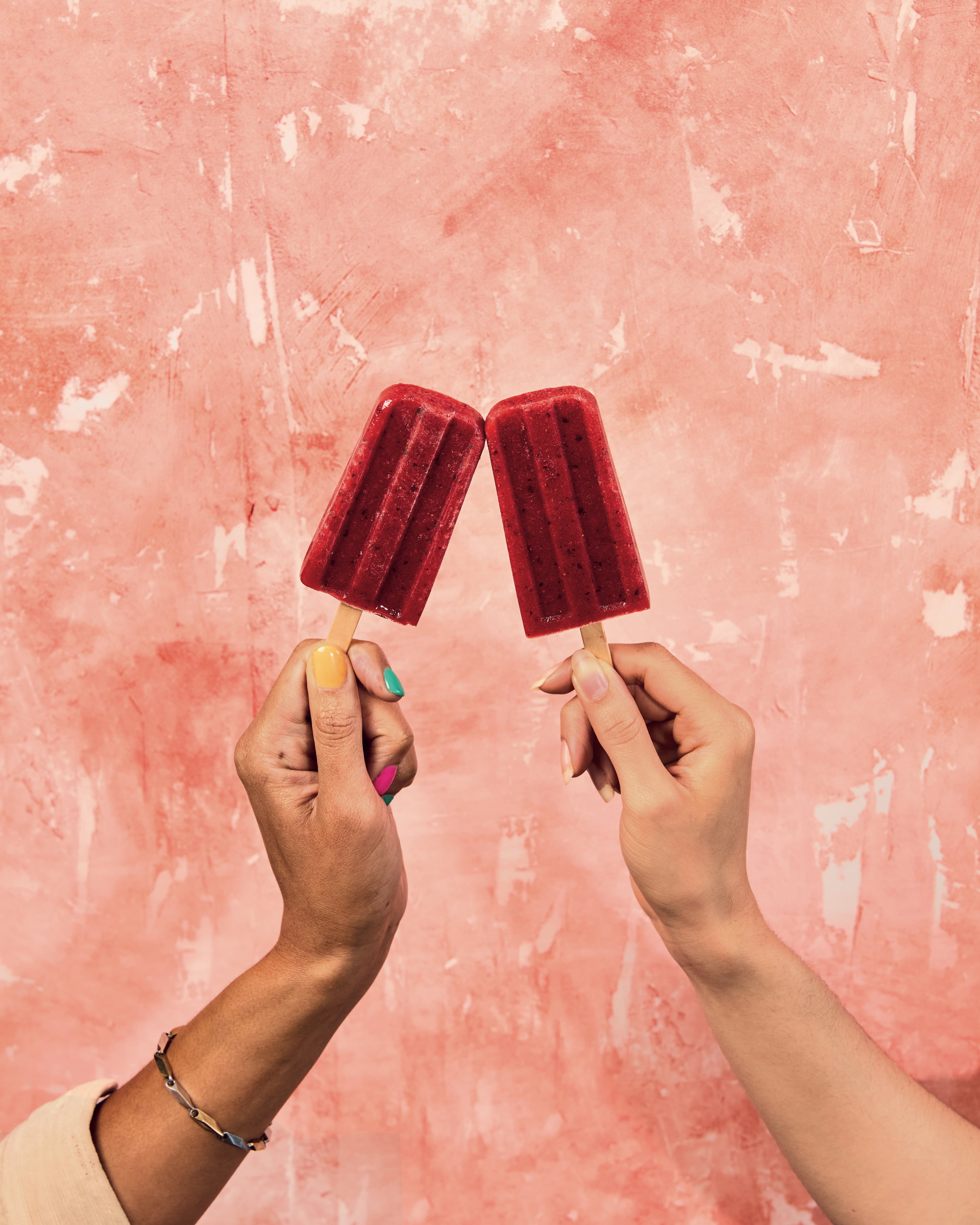 Fresh basil adds a nice, herby balance that complements the sweetness of the strawberries in these frozen pops. (Courtesy of Brittany Conerly)