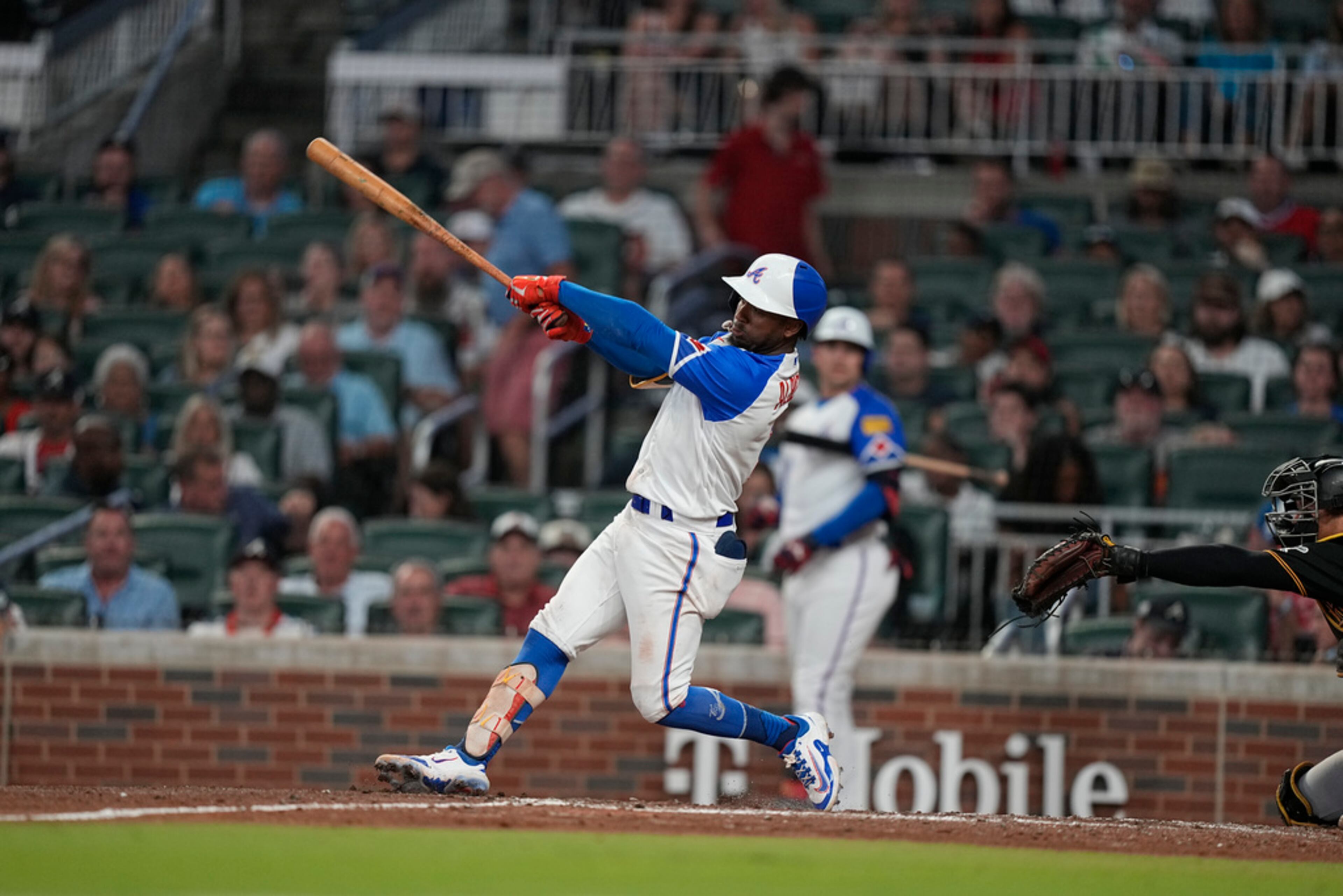 Atlanta Braves' Ozzie Albies (1) singles in the third inning of a baseball game against the Pittsburgh Pirates, Saturday, Sept. 9, 2023, in Atlanta. (AP Photo/Brynn Anderson)