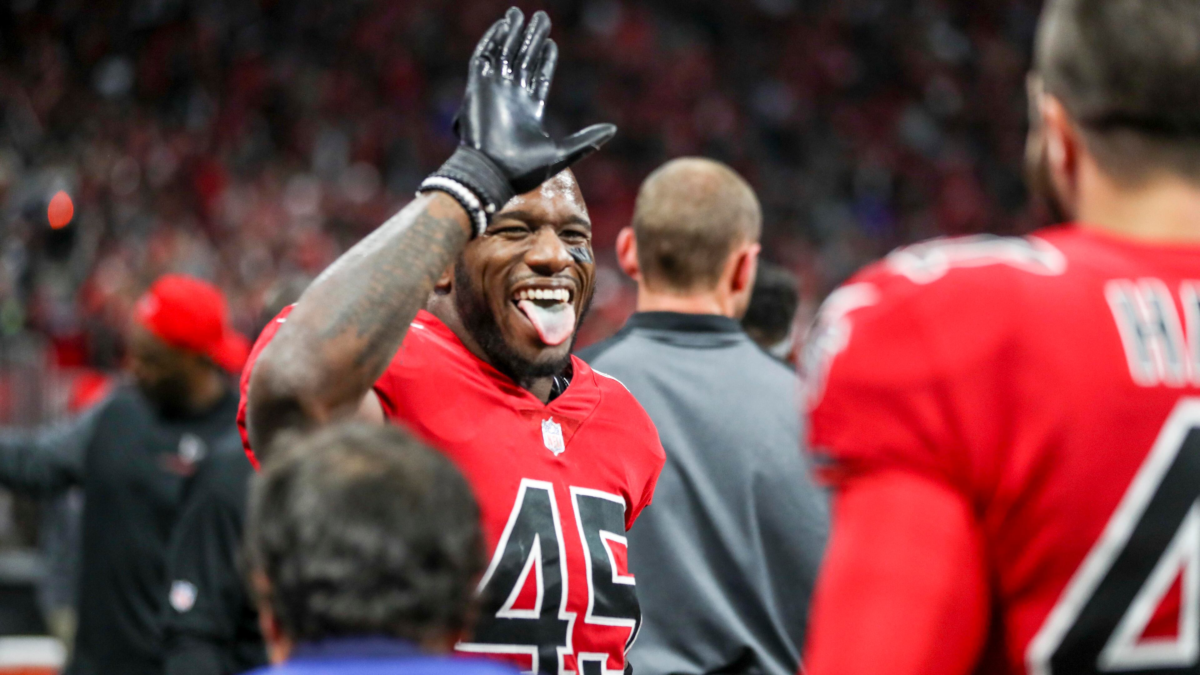Atlanta Falcons middle linebacker Deion Jones (45) celebrates after incepting the ball late in the fourth quarter against the New Orleans Saints Thursday, Dec. 7, 2017, at Mercedes-Benz Stadium in Atlanta.