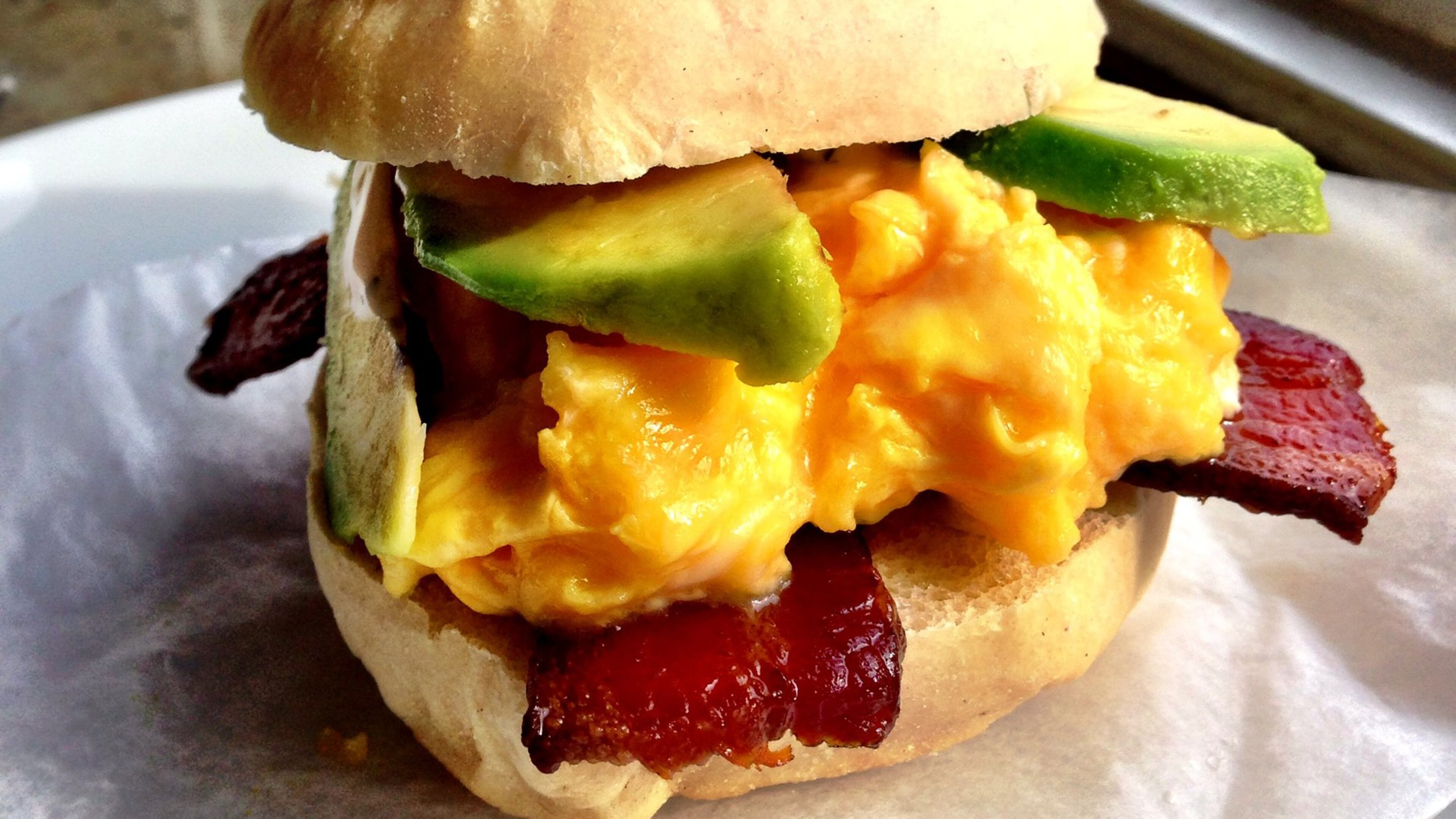 The Egg McMuff at 8arm is loaded with soft scrambled egg, avocado, bacon and cilantro-Tabasco mayo. (Wyatt Williams)