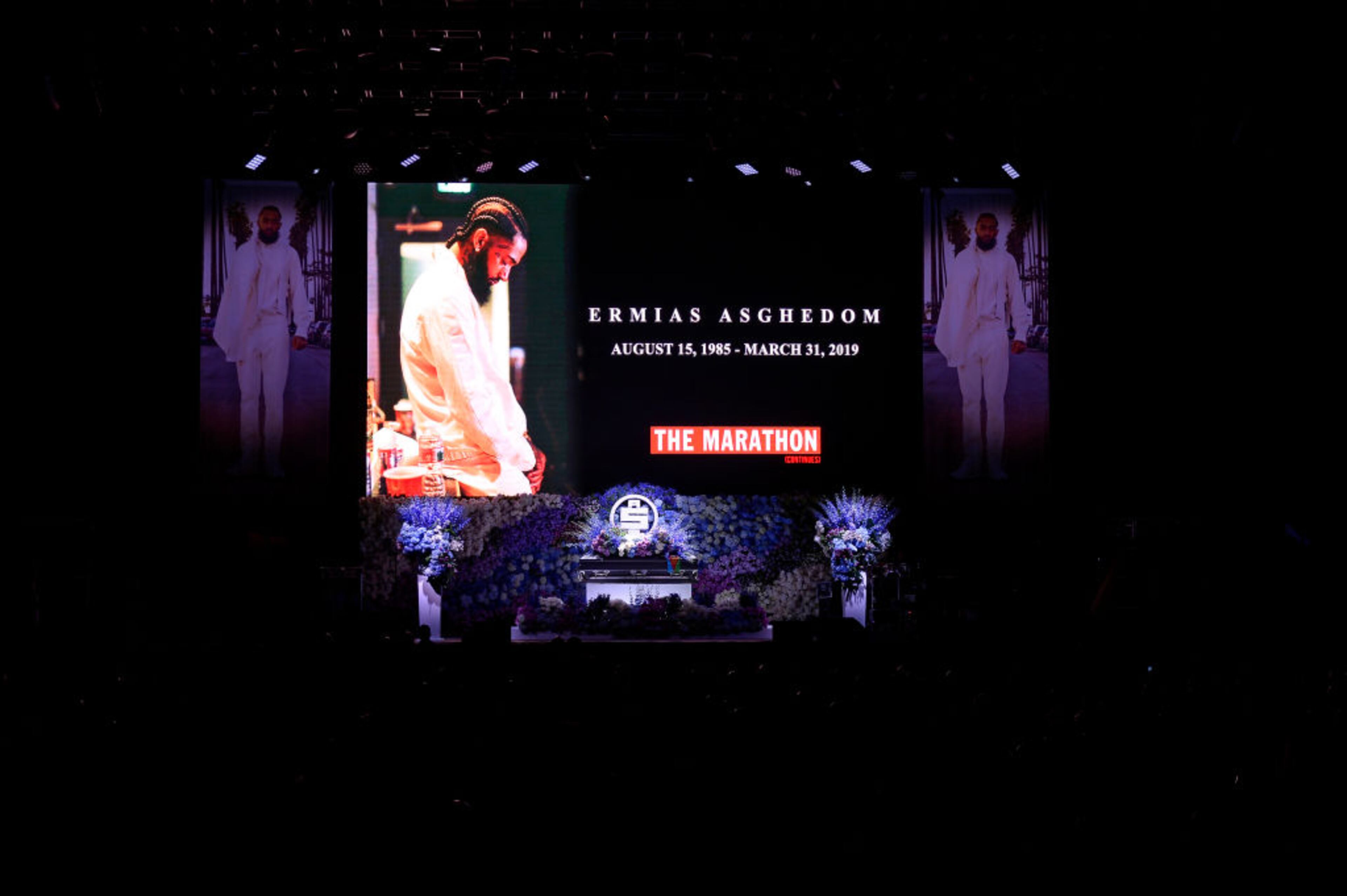 LOS ANGELES, CALIFORNIA - APRIL 11: (EDITORS NOTE: All images taken by Getty Images inside the Staples Center at Nipsey Hussle's Celebration of Life have been reviewed and approved for distribution by Atlantic Records) Photos are displayed during Nipsey Hussle's Celebration of Life at STAPLES Center on April 11, 2019 in Los Angeles, California. Nipsey Hussle was shot and killed in front of his store, The Marathon Clothing, on March 31, 2019 in Los Angeles. (Photo by Kevork Djansezian/Getty Images For Atlantic Records)