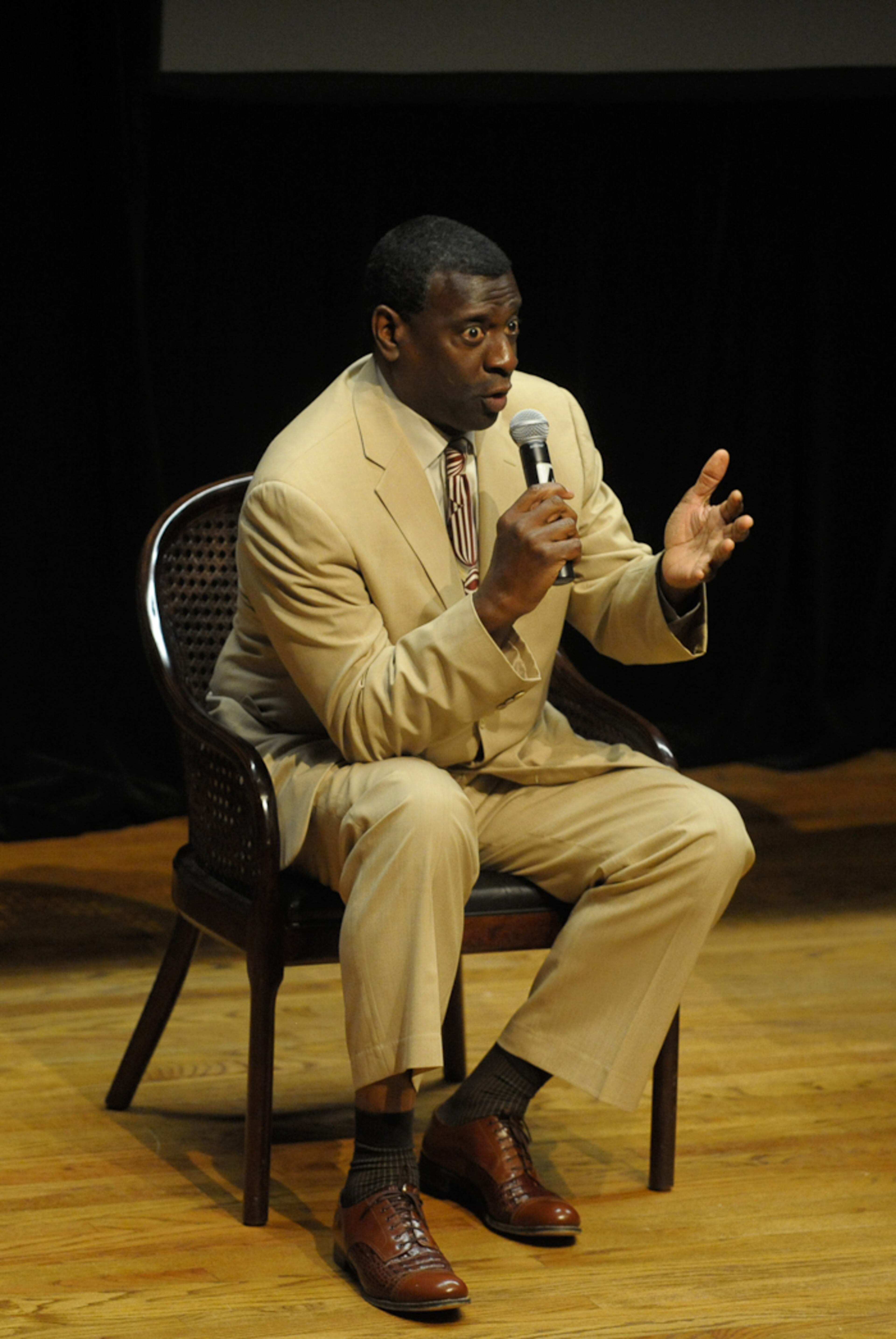 Actor Afemo Omilami, who plays Drum in Lifetime's "Steel Magnolias," talks to a packed house after the premiere held at the Georgia Pacific Auditorium in downtown Atlanta. The movie is a remake of the 1989 "Steel Magnolias."