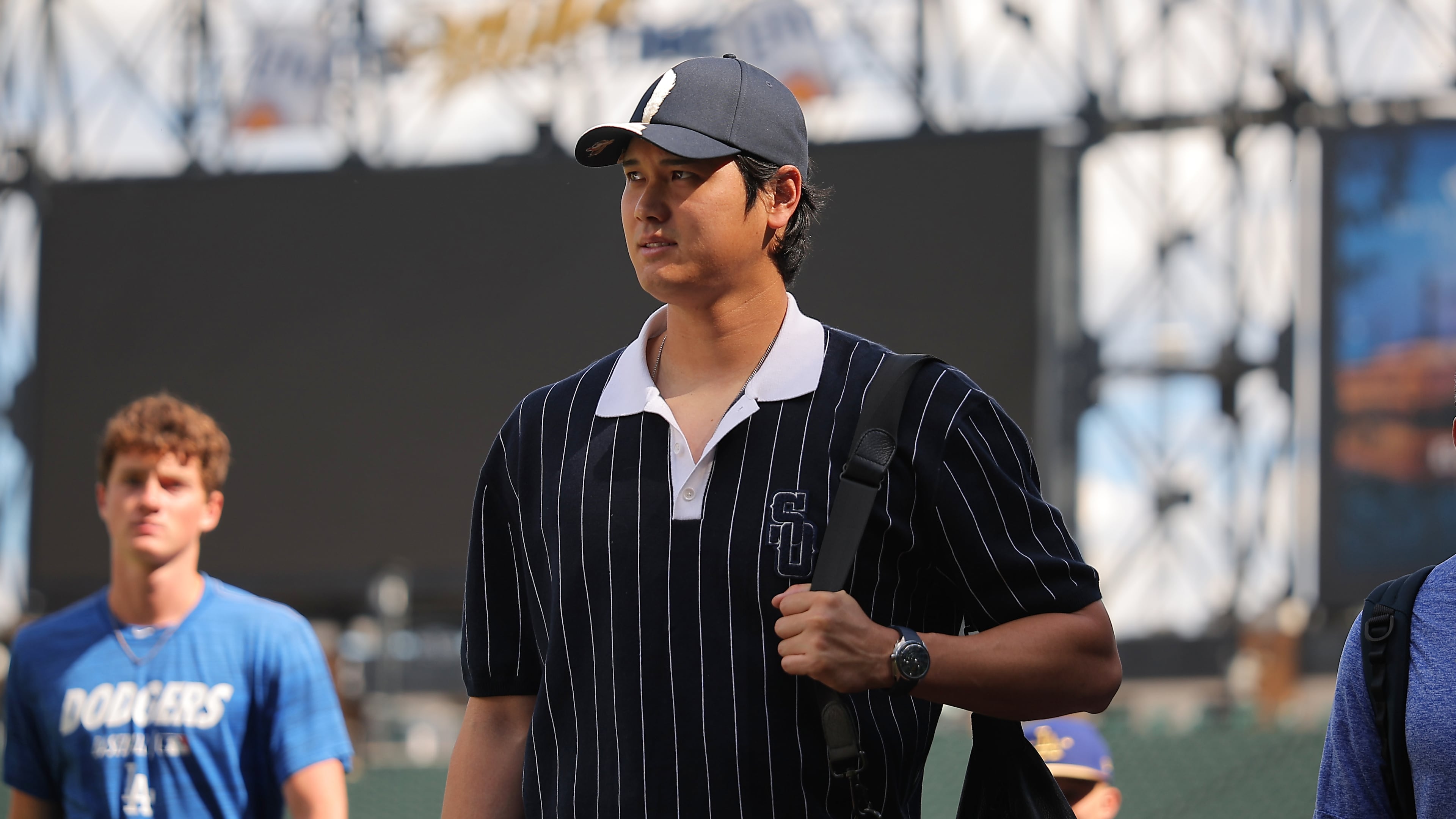Los Angeles Dodgers' Shohei Ohtani enters the field prior to a baseball game against the Chicago White Sox, Friday, June 12, 2026, in Chicago. (AP Photo/Melissa Tamez)