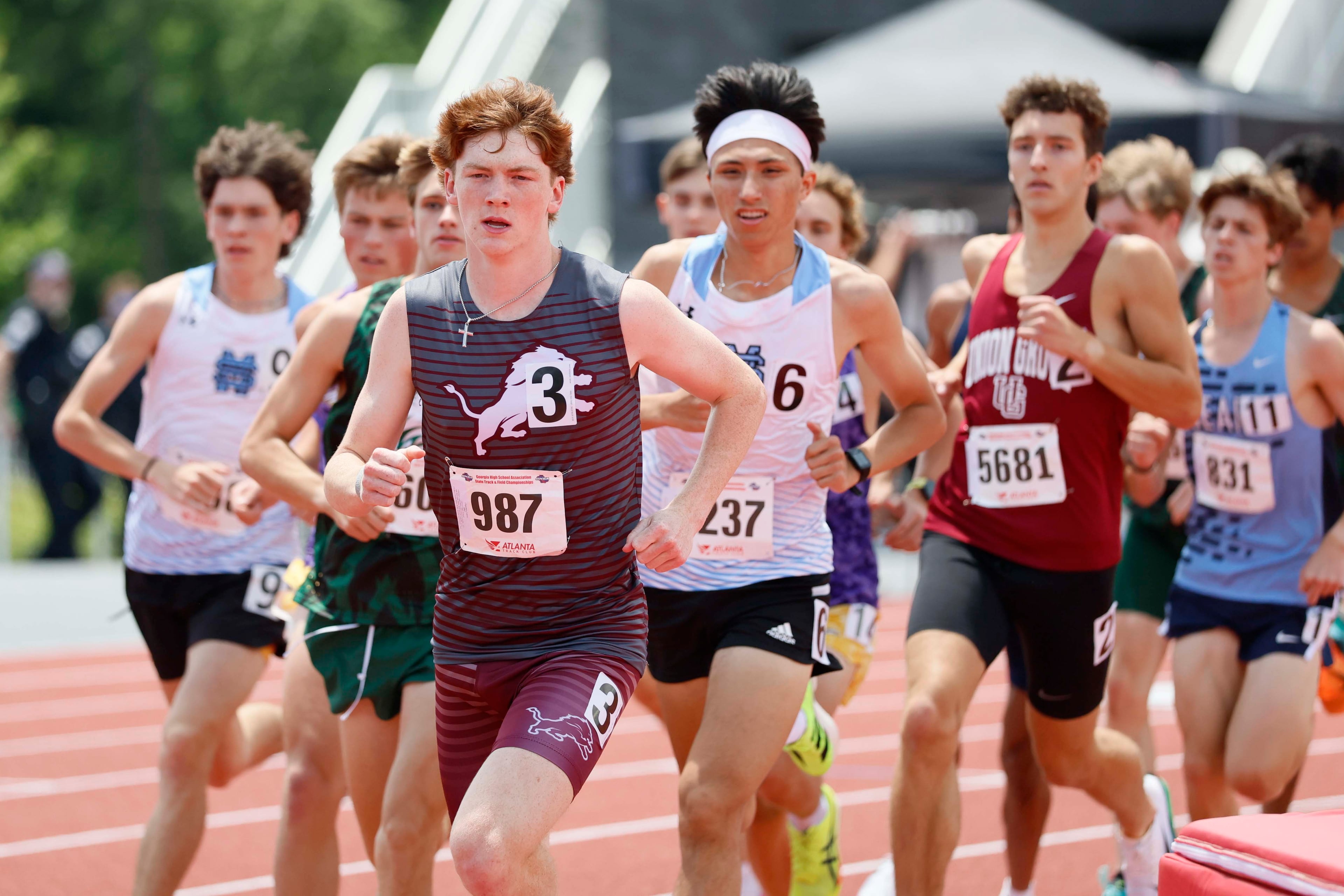 Runners compete in the Boys 1600-meter Run AAAA at the GHSA track and field state championships at UGA Spec Towns Track on Monday, May 11, 2026, in Athens.
(Miguel Martinez/AJC)