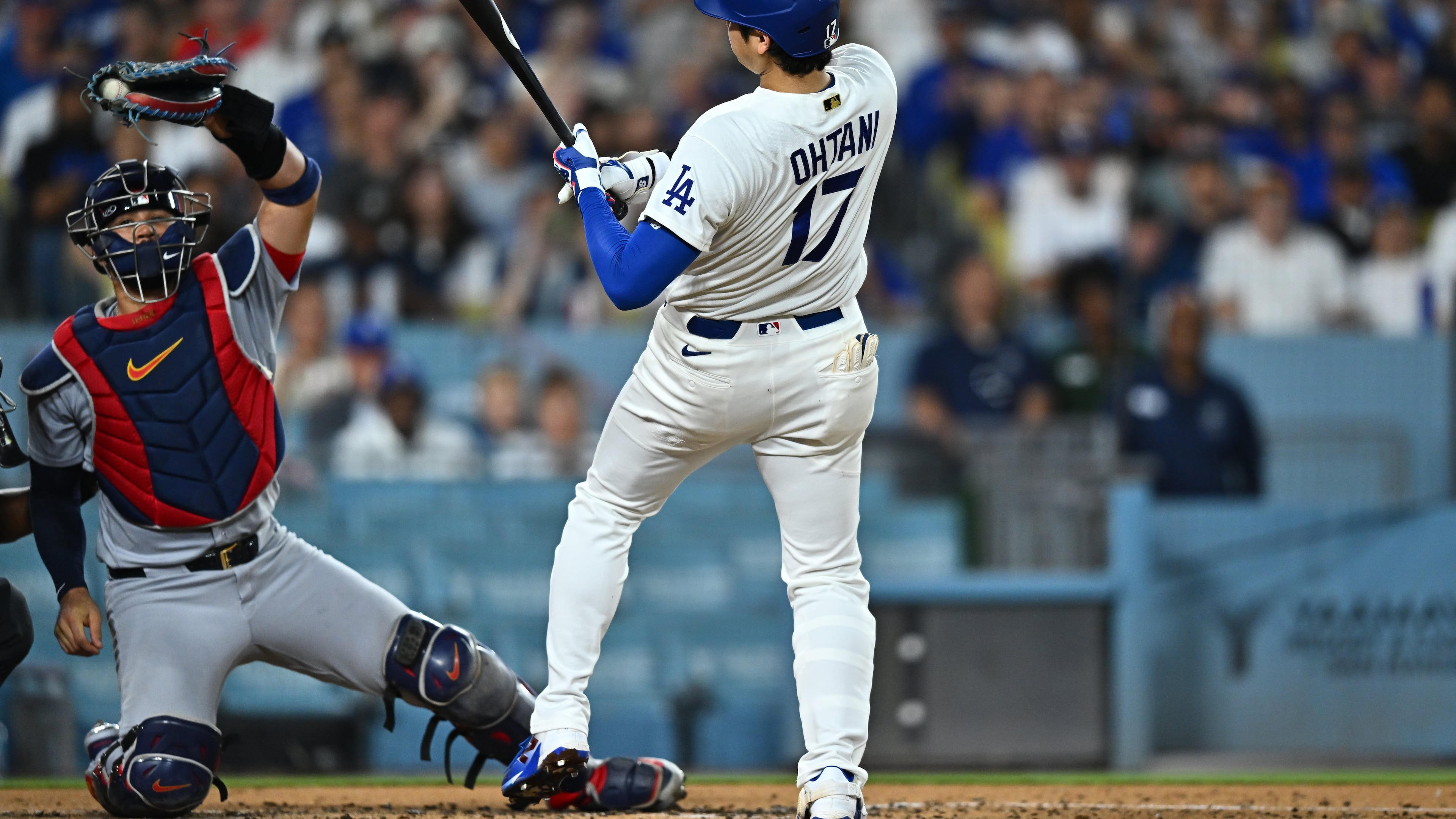 Los Angeles Dodgers' Shohei Ohtani (17) takes a close pitch during the second inning of a baseball game against the St. Louis Cardinals, Wednesday, Sept. 2, 2026, in Los Angeles. (AP Photo/William Liang)