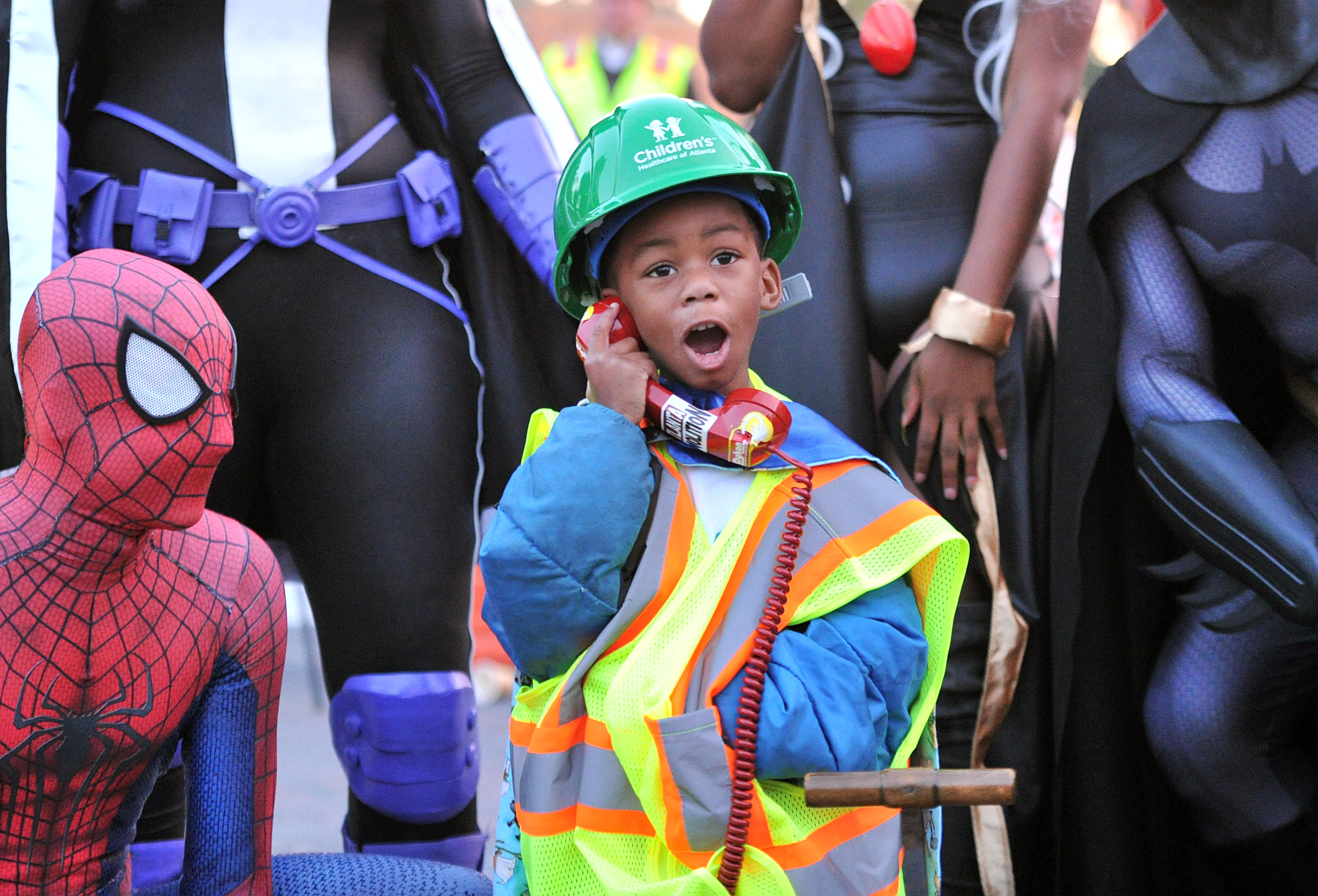 "Super DJ" reacts as he looks at the 19-story former Executive Park Motor building that he will order to implode at the corner of I-85 and North Druid Hills Road on Saturday morning, November 8, 2014. HYOSUB SHIN / HSHIN@AJC.COM